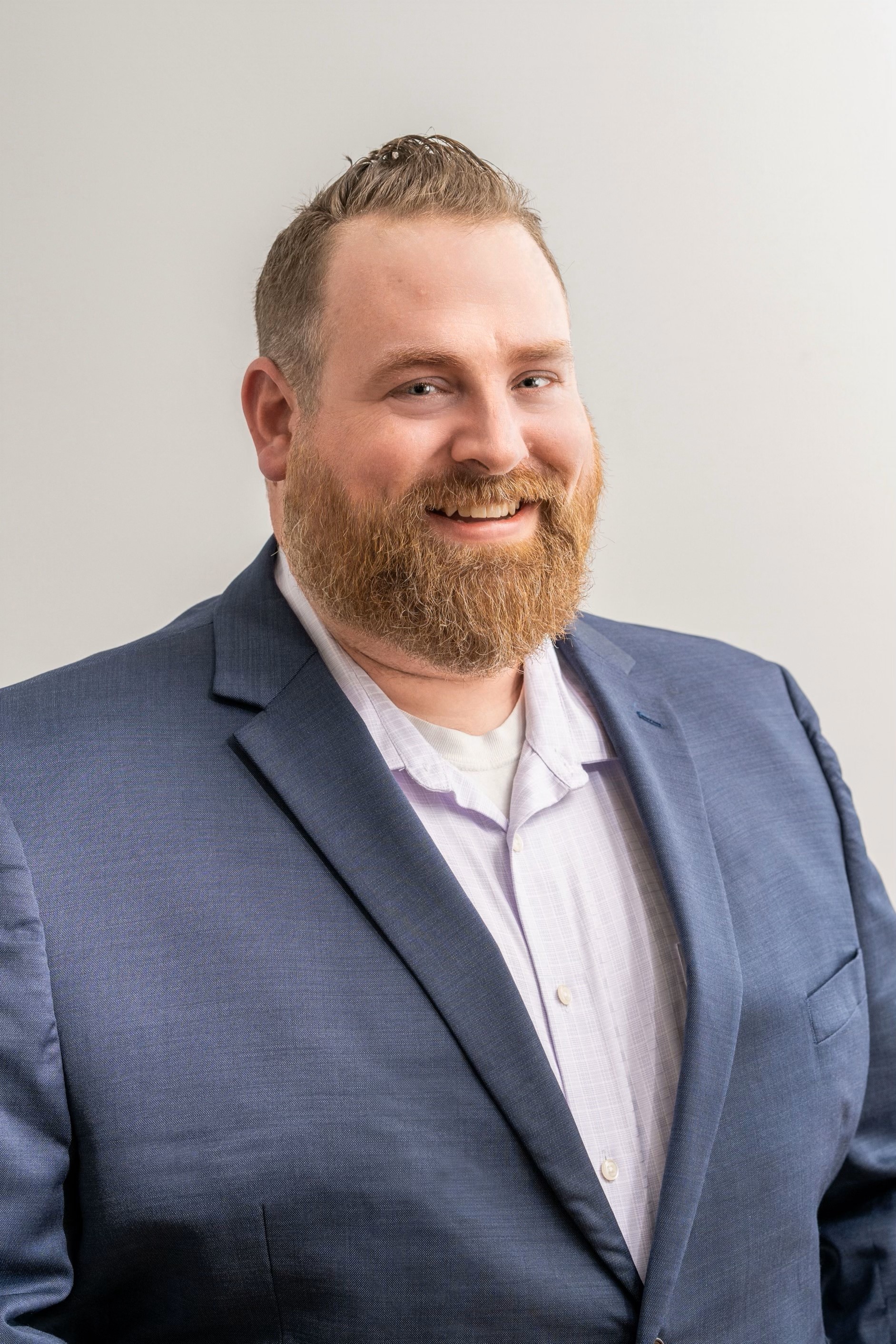 man in suit auction account manager