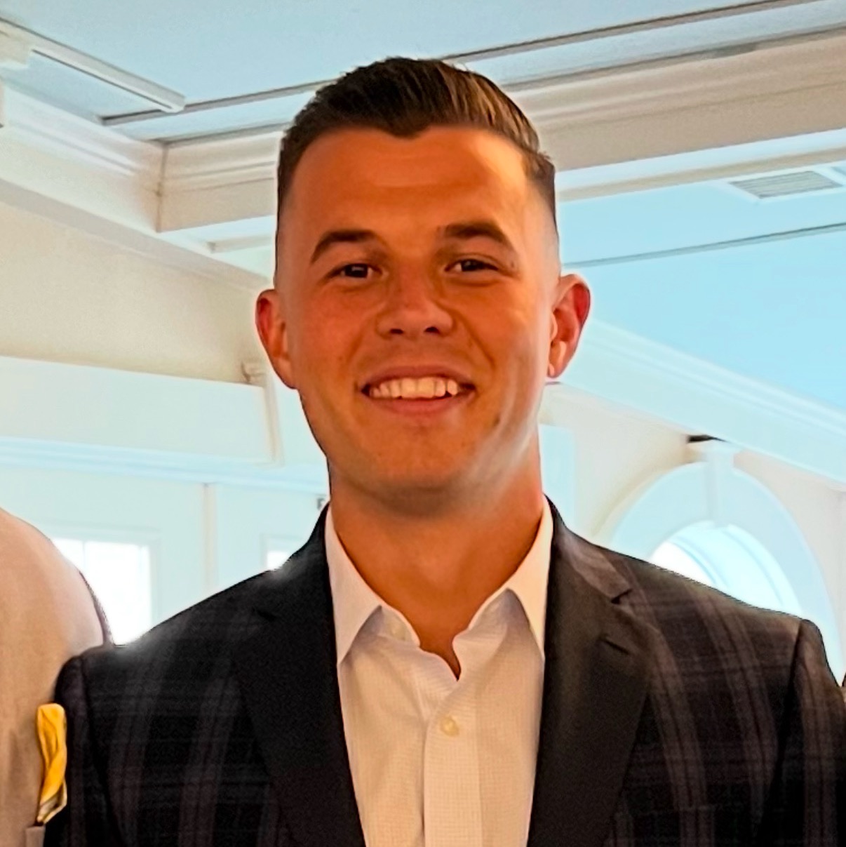 man in suit auction account manager