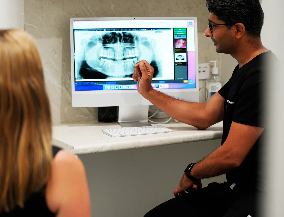 A Focus specialist reviewing imaging with a colleague