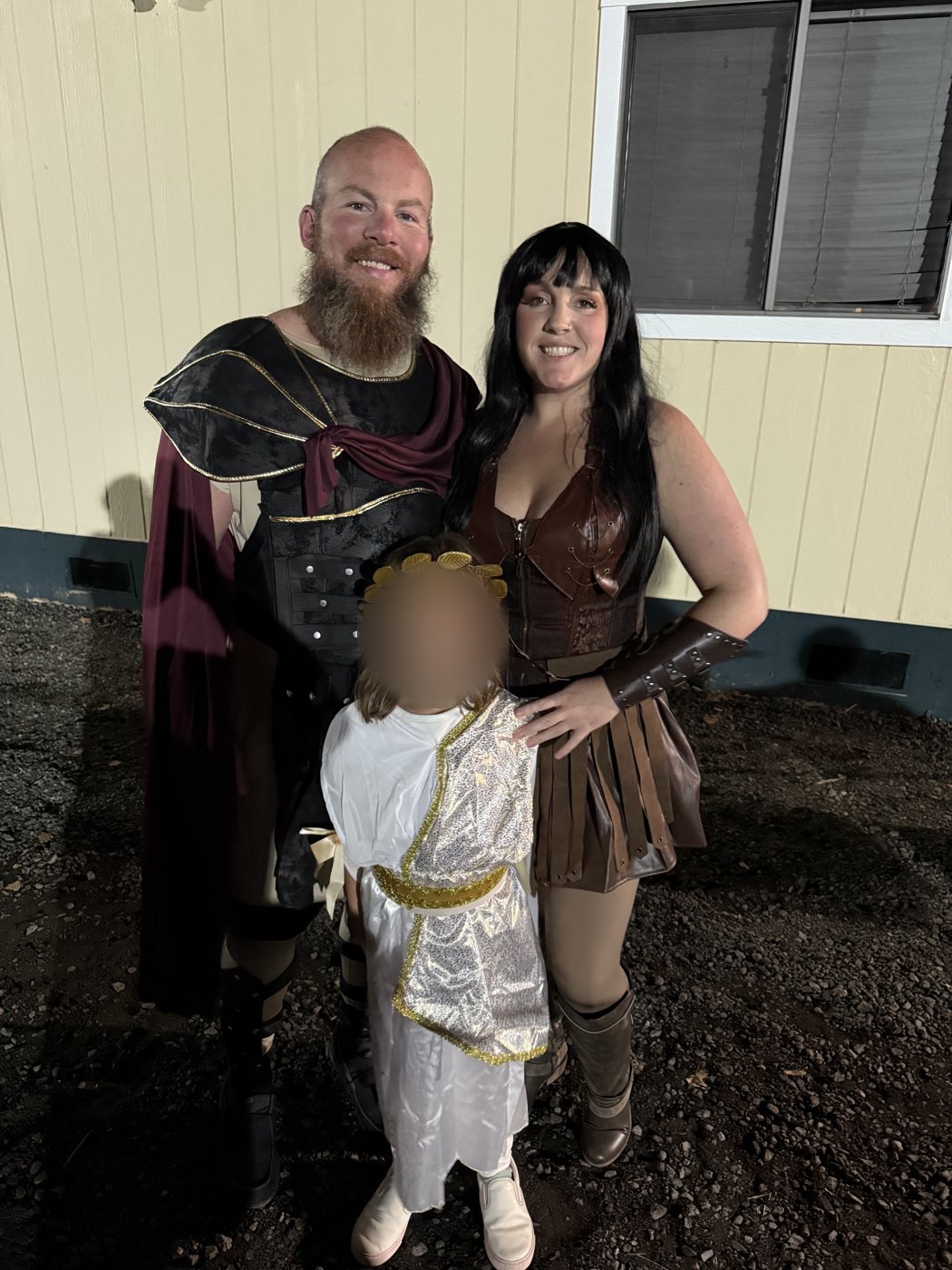Family dressed as Hercules, Xena Warrior Princess and a Greek goddess