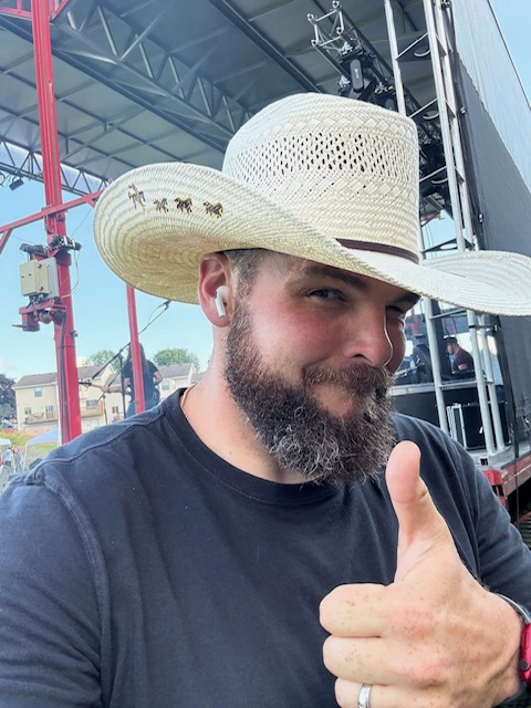Customer wearing his finished, decorated custom hat