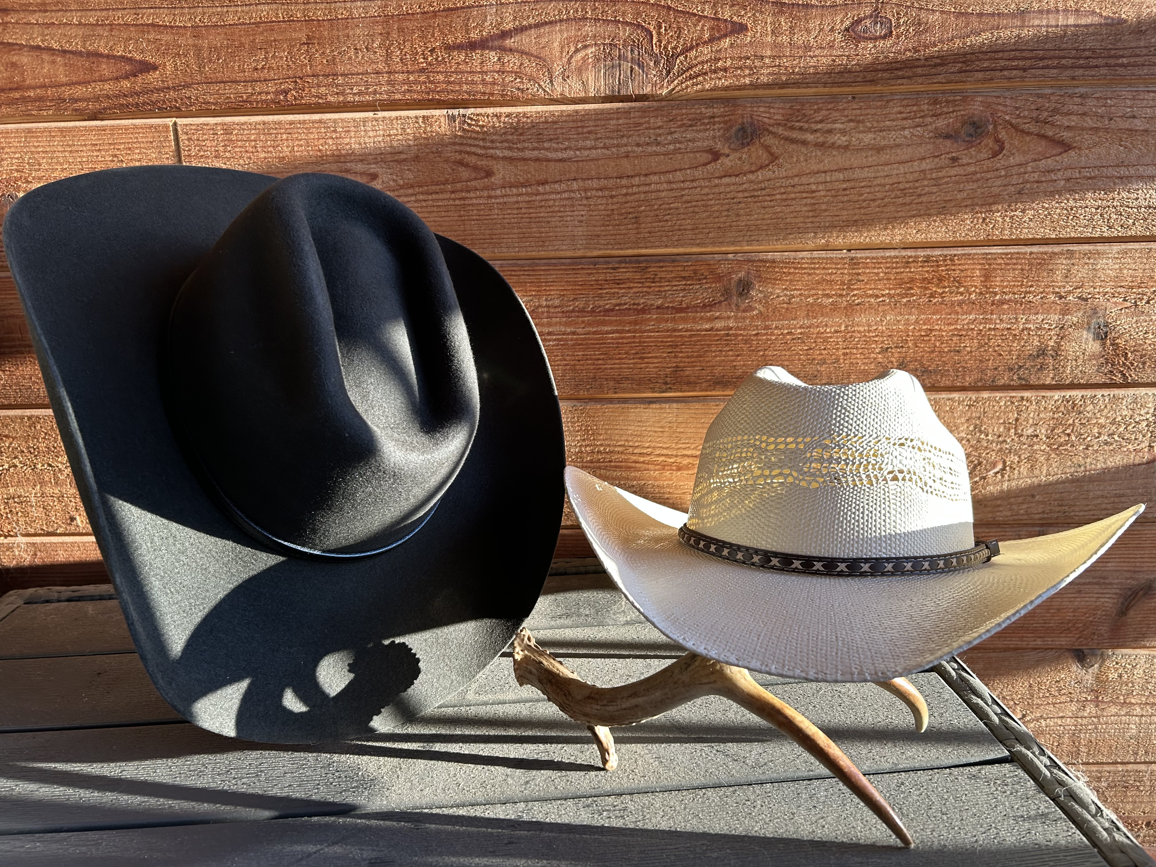 Choosing a hat material — felt and straw hats side by side