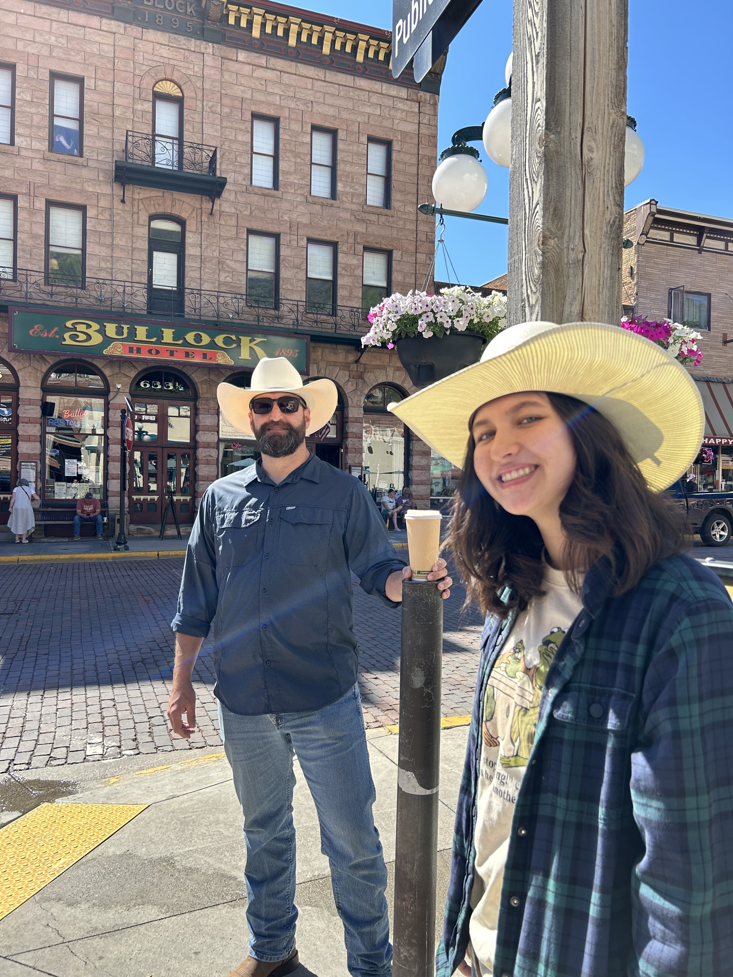 The owner of Hangman Hats and his oldest daughter exploring the historic main street of Deadwood, South Dakota during the same trip