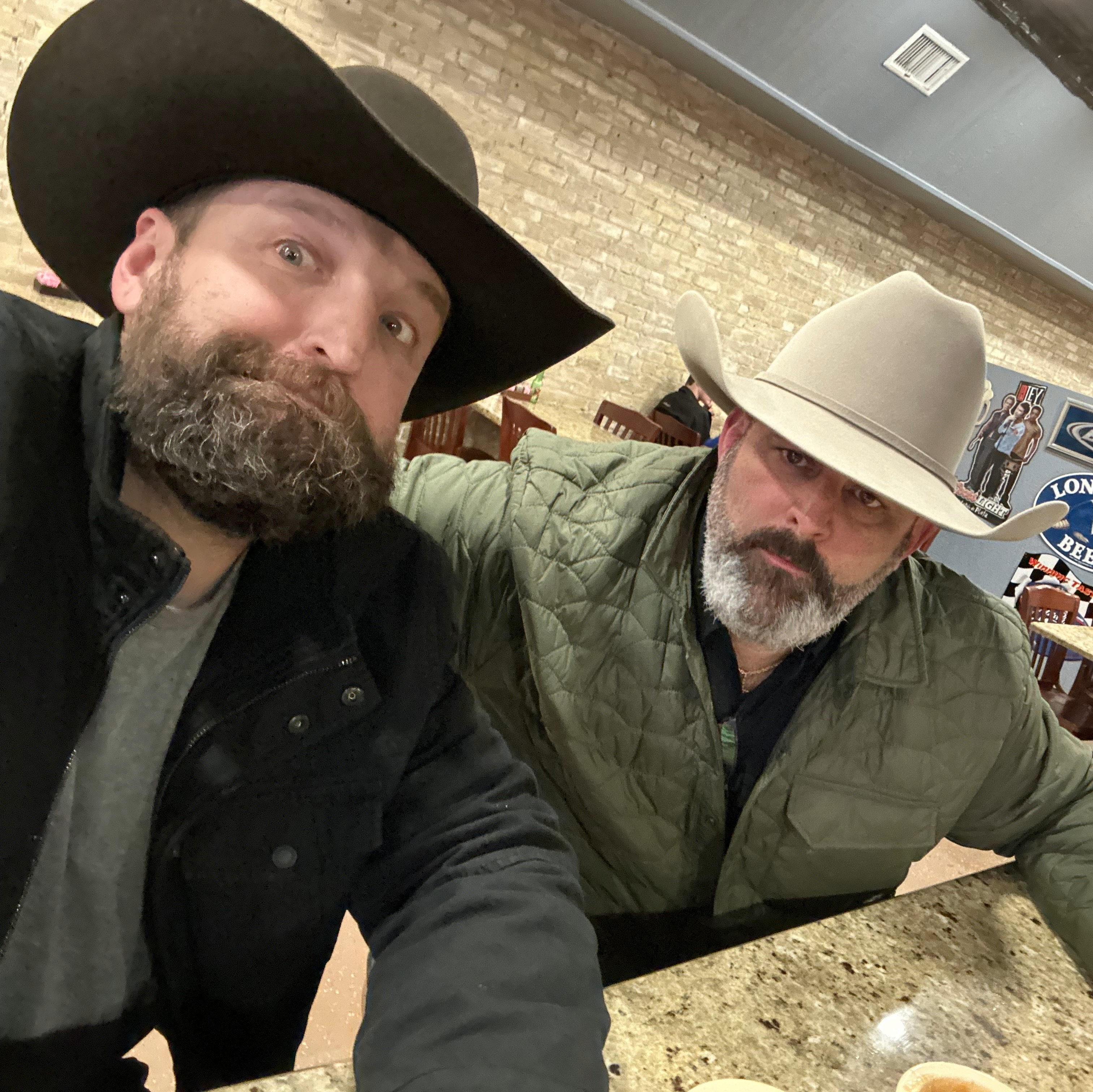 Customer deciding on a hat