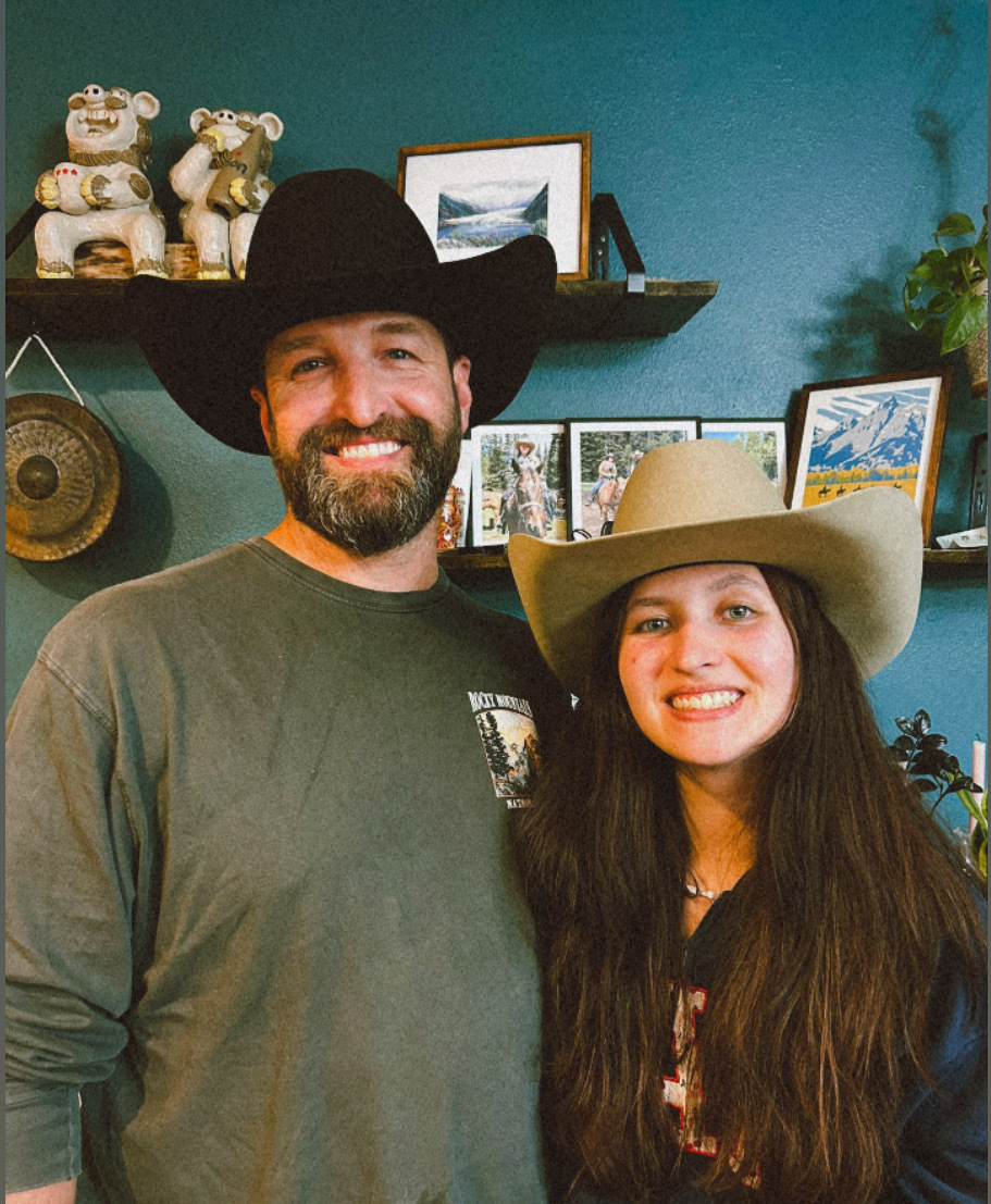 Justin and his daughter wearing cowboy hats at home