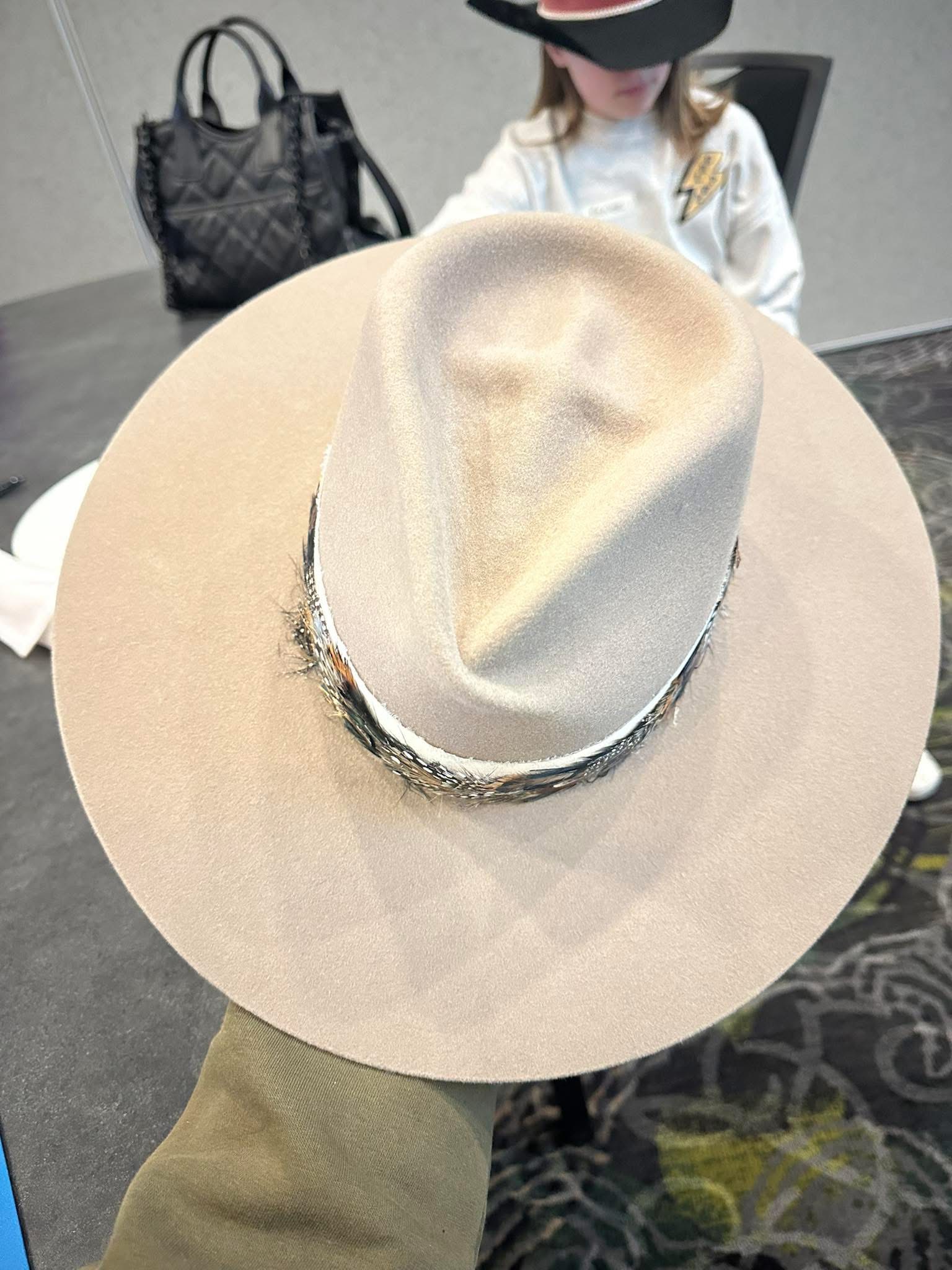 Cross crease crown with feather hatband