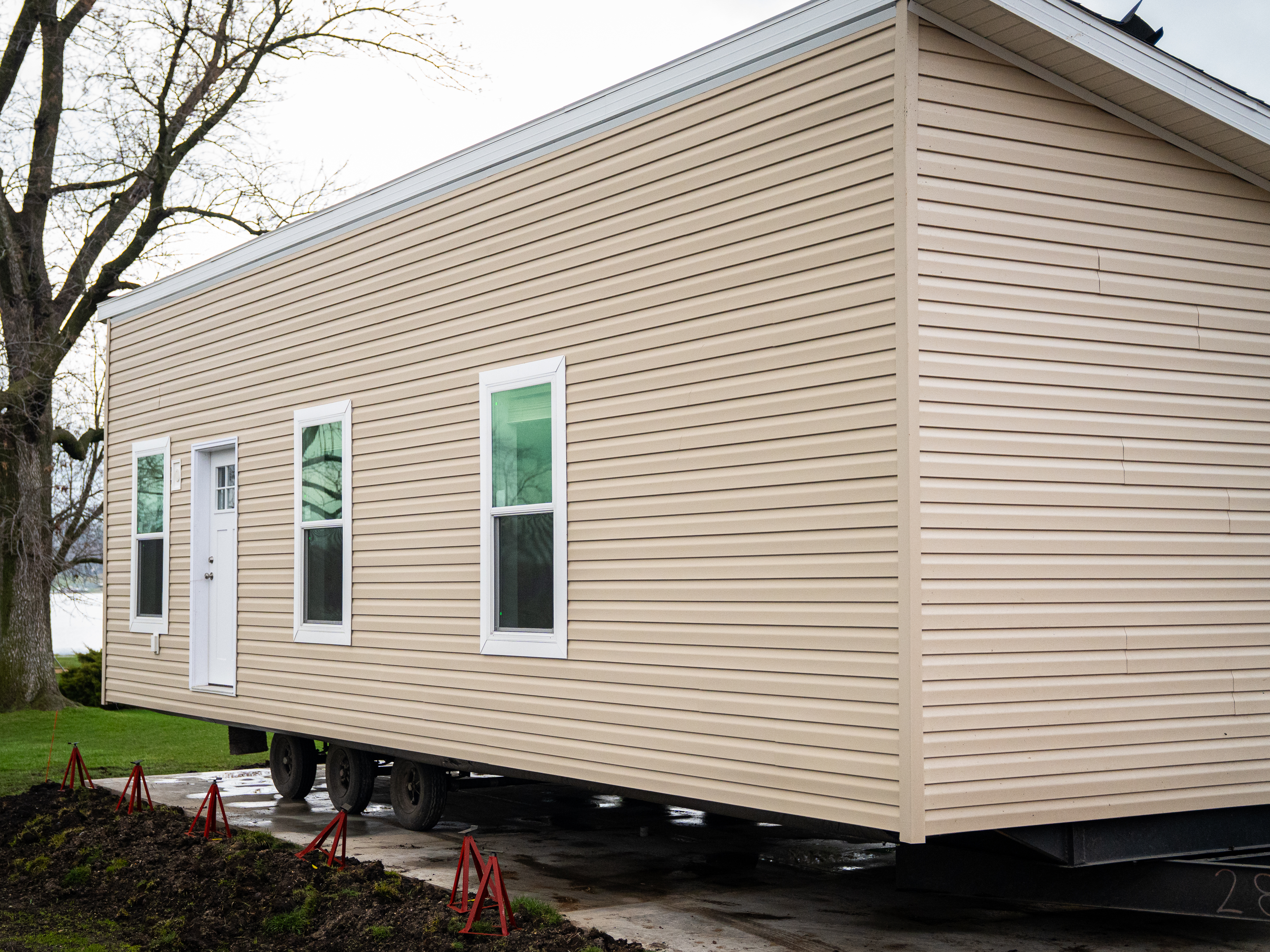 A manufactured home sitting on wheels