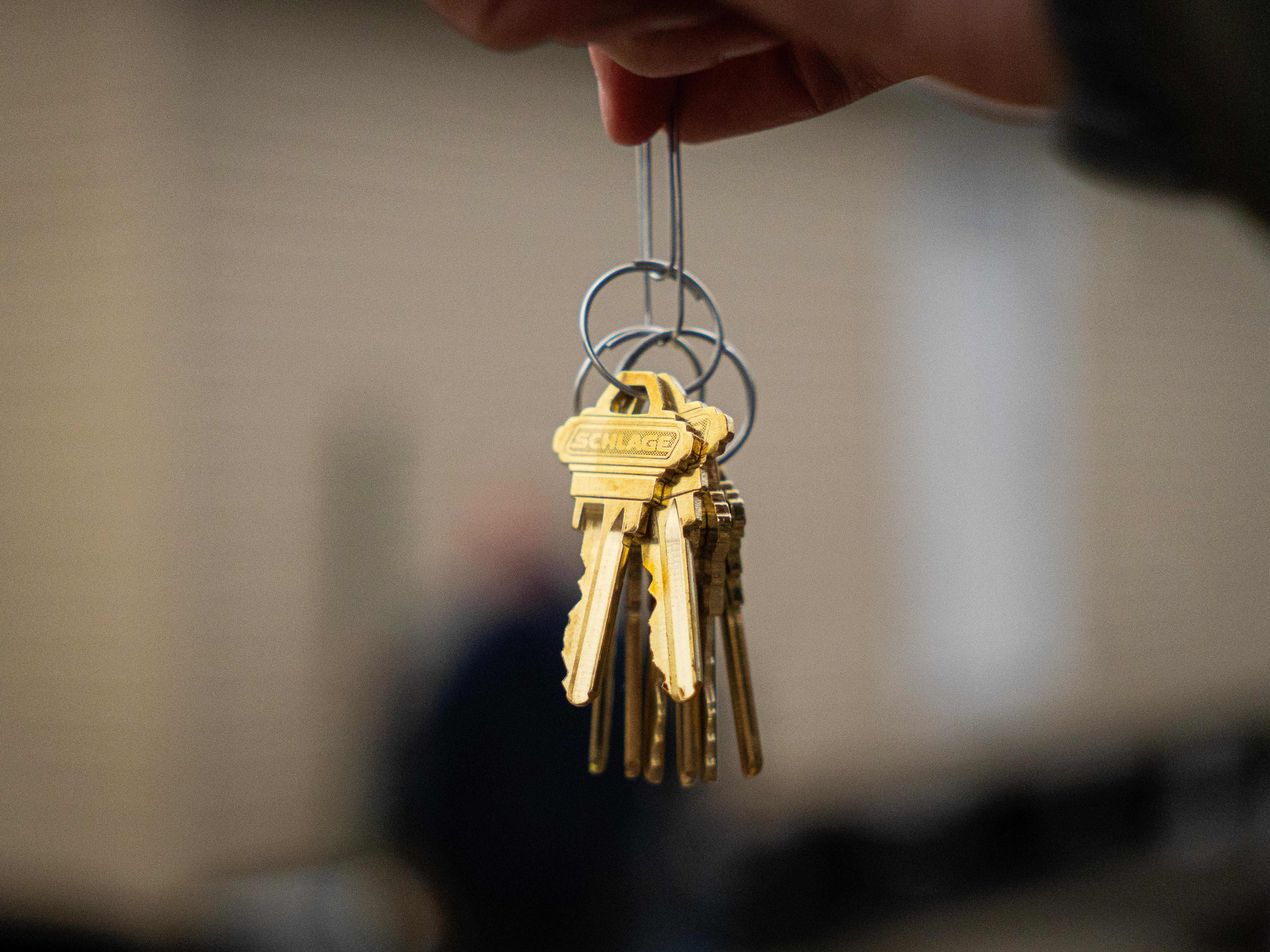 A set of keys dangling in front of a manufactured home