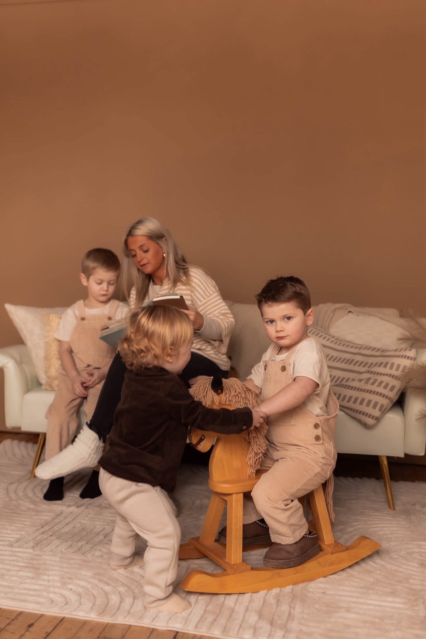 Krista posed for a photo with her three young boys. 