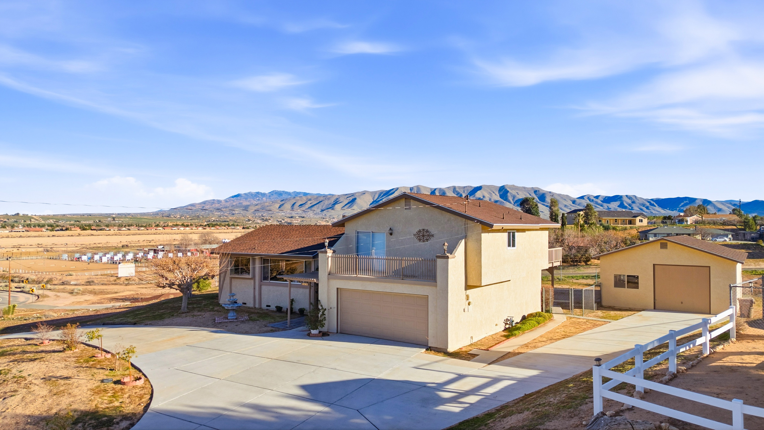 18785 Talisman, Hesperia CA 92345 — 3 bed, 2.5 bath custom tri-level with 2,384 sq ft, panoramic Mojave River & mountain views, wraparound deck, and detached RV-style garage/workshop