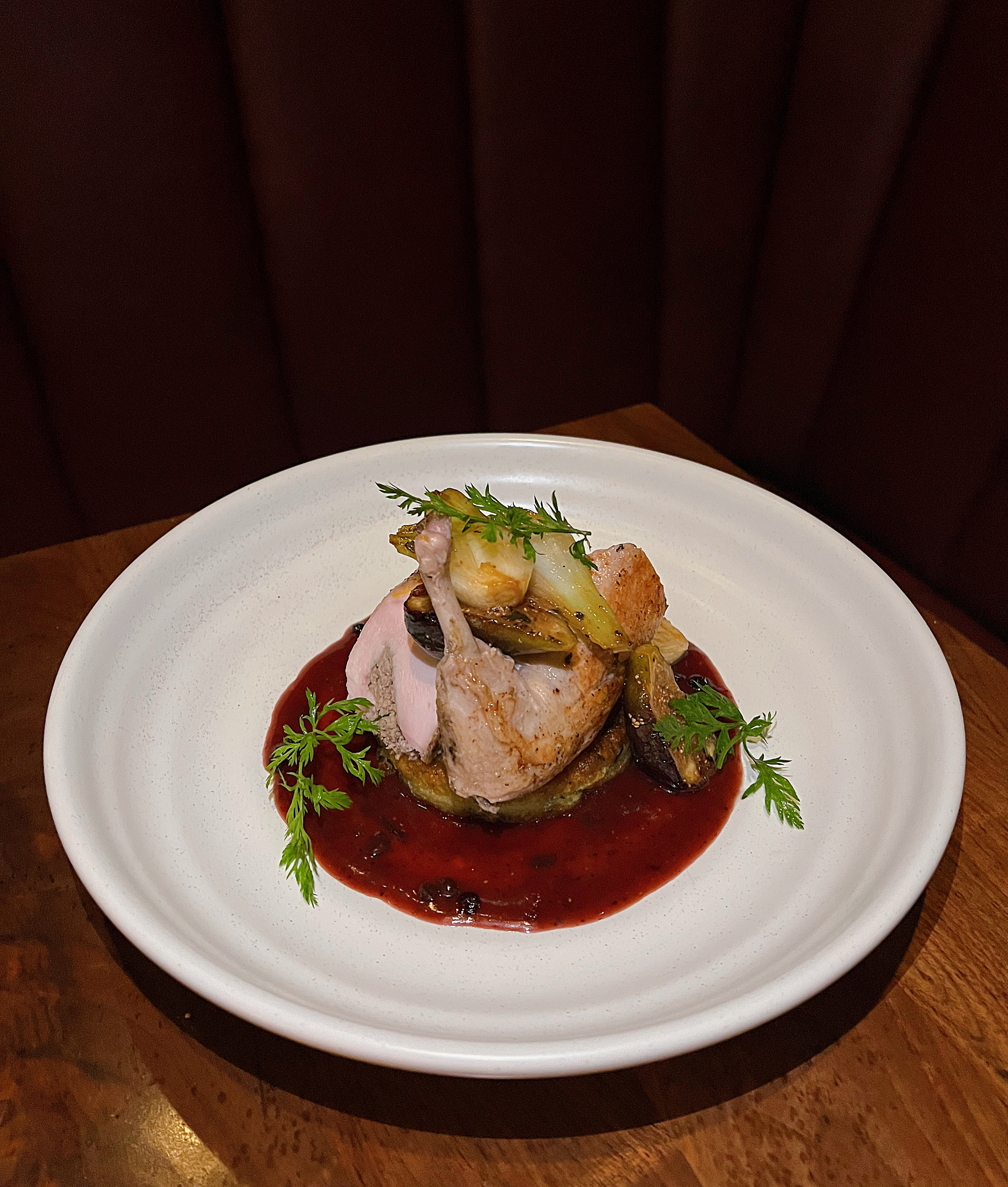 Roasted Pork Tenderloin & Red Berry Coulis at Et Voilà French Bistro