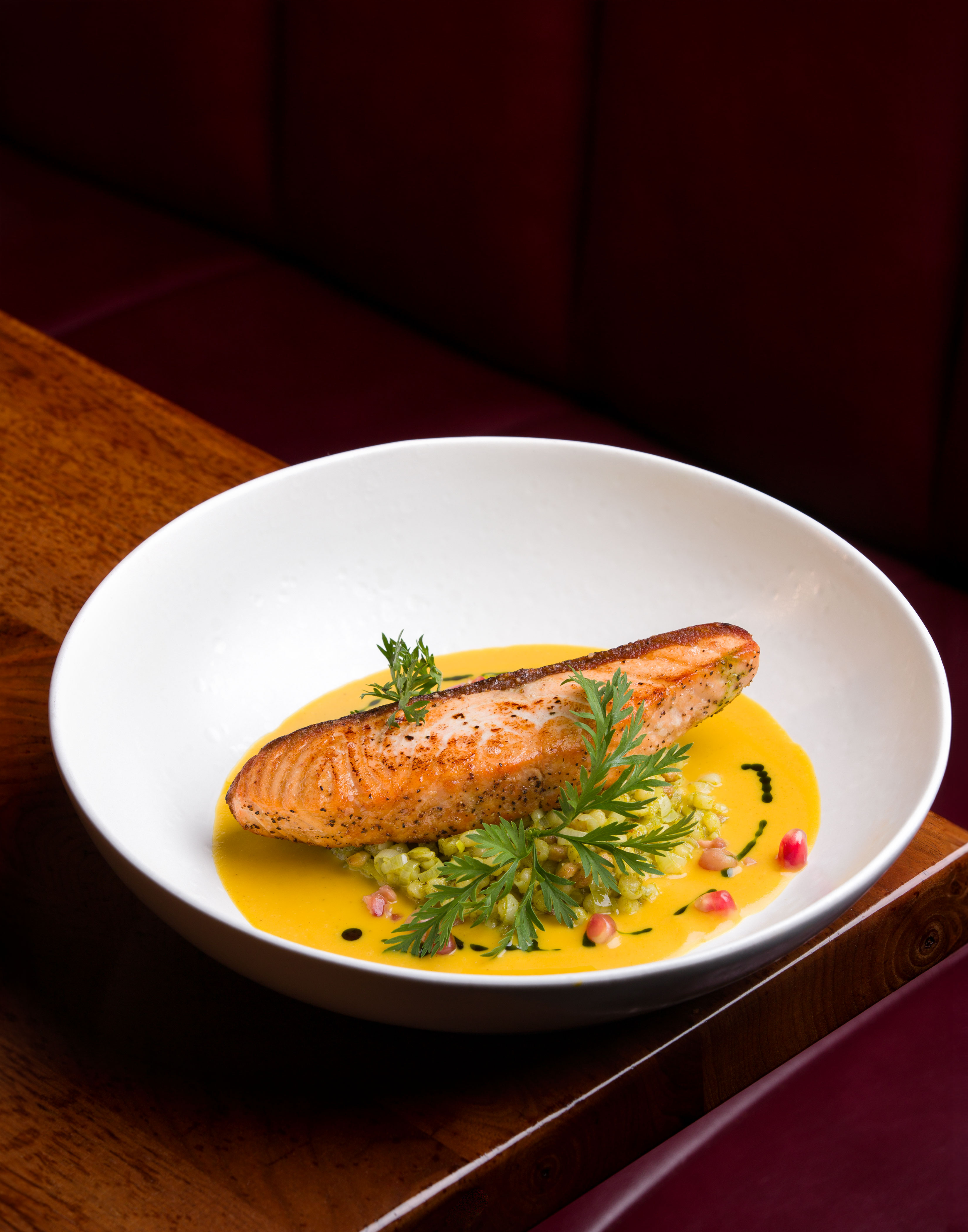 Pan-Seared Salmon on Saffron Purée at Et Voilà French Bistro