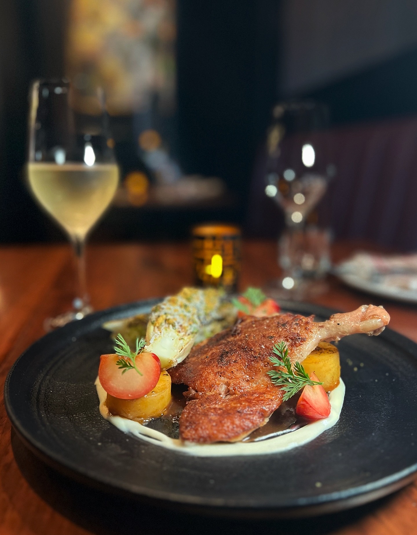 Crispy Duck Confit & Braised Endive at Et Voilà French Bistro