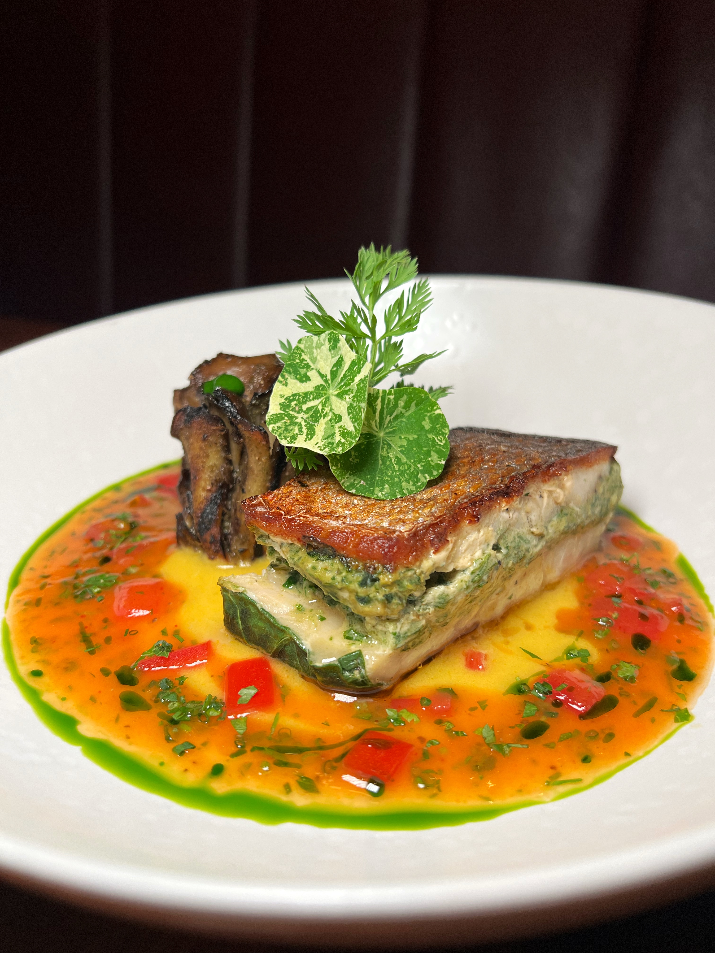 Layered Herb Terrine & Pepper Coulis at Et Voilà French Bistro