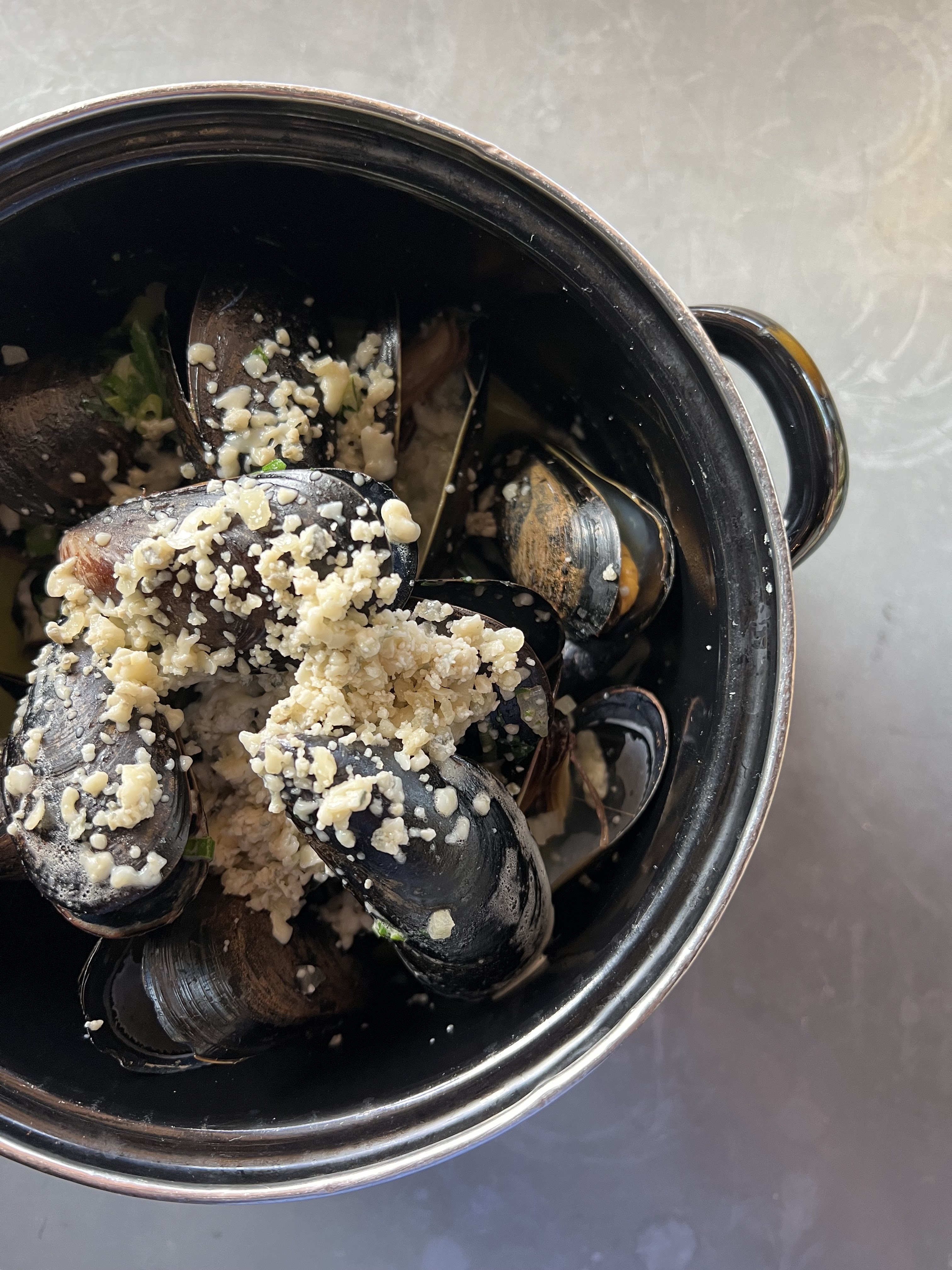 Steamed Mussels with Parmesan Herb Gratin at Et Voilà French Bistro