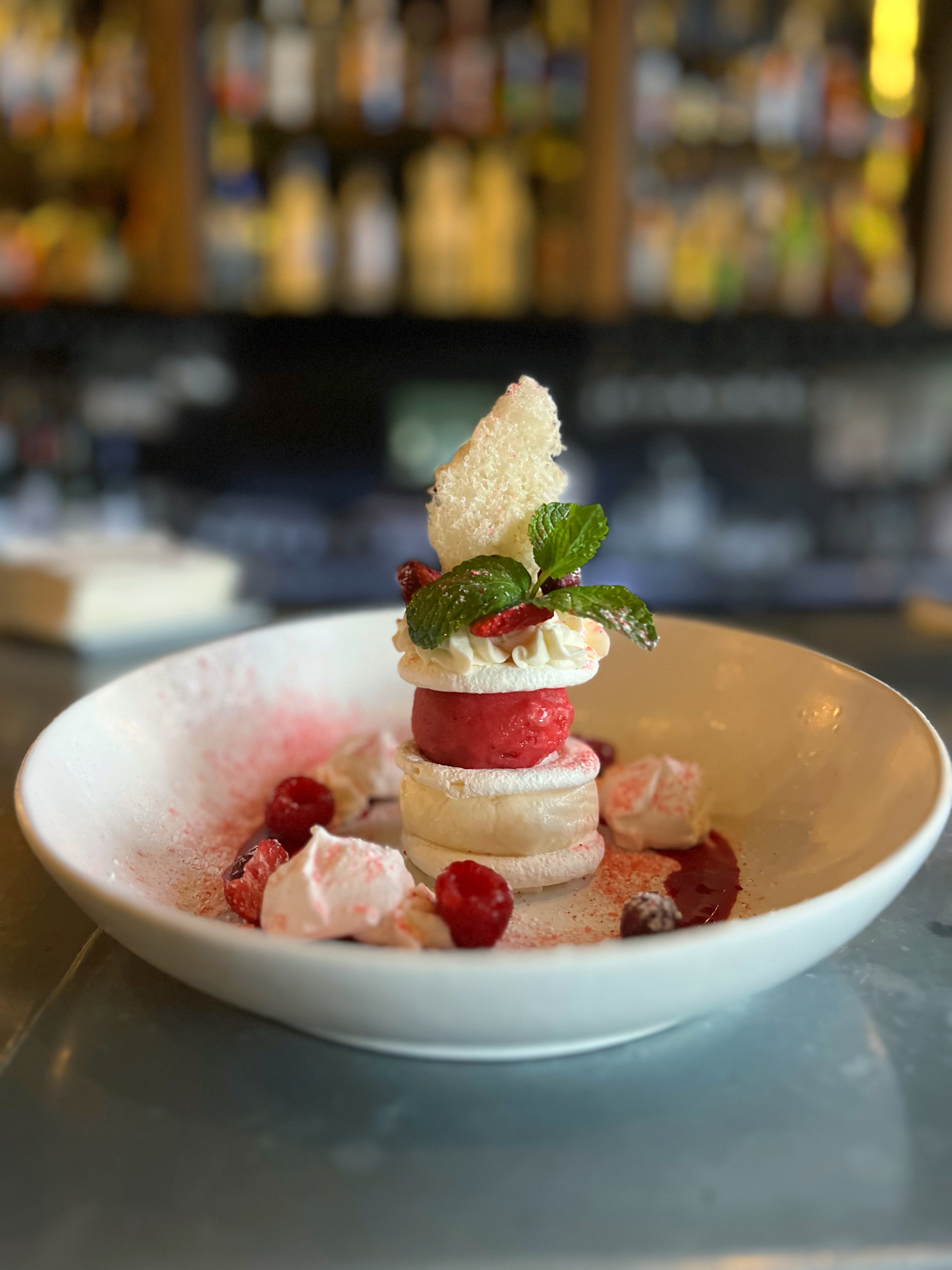Meringue Pavlova with Raspberry Sorbet at Et Voilà French Bistro