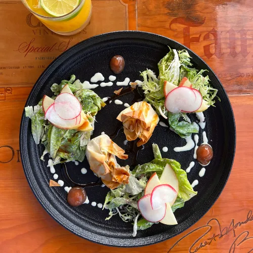 Garden Salad with Citrus Aperitif at Et Voilà French Bistro