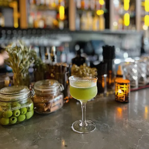 Green Apéritif on the Bar at Et Voilà French Bistro