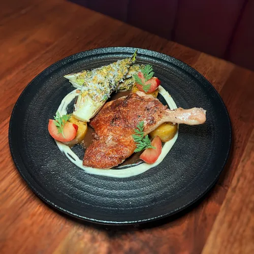 Crispy Chicken with Roasted Vegetables at Et Voilà French Bistro