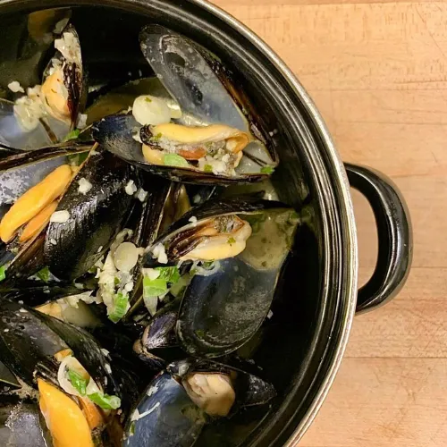 Mussels in Creamy White Wine Sauce at Et Voilà French Bistro