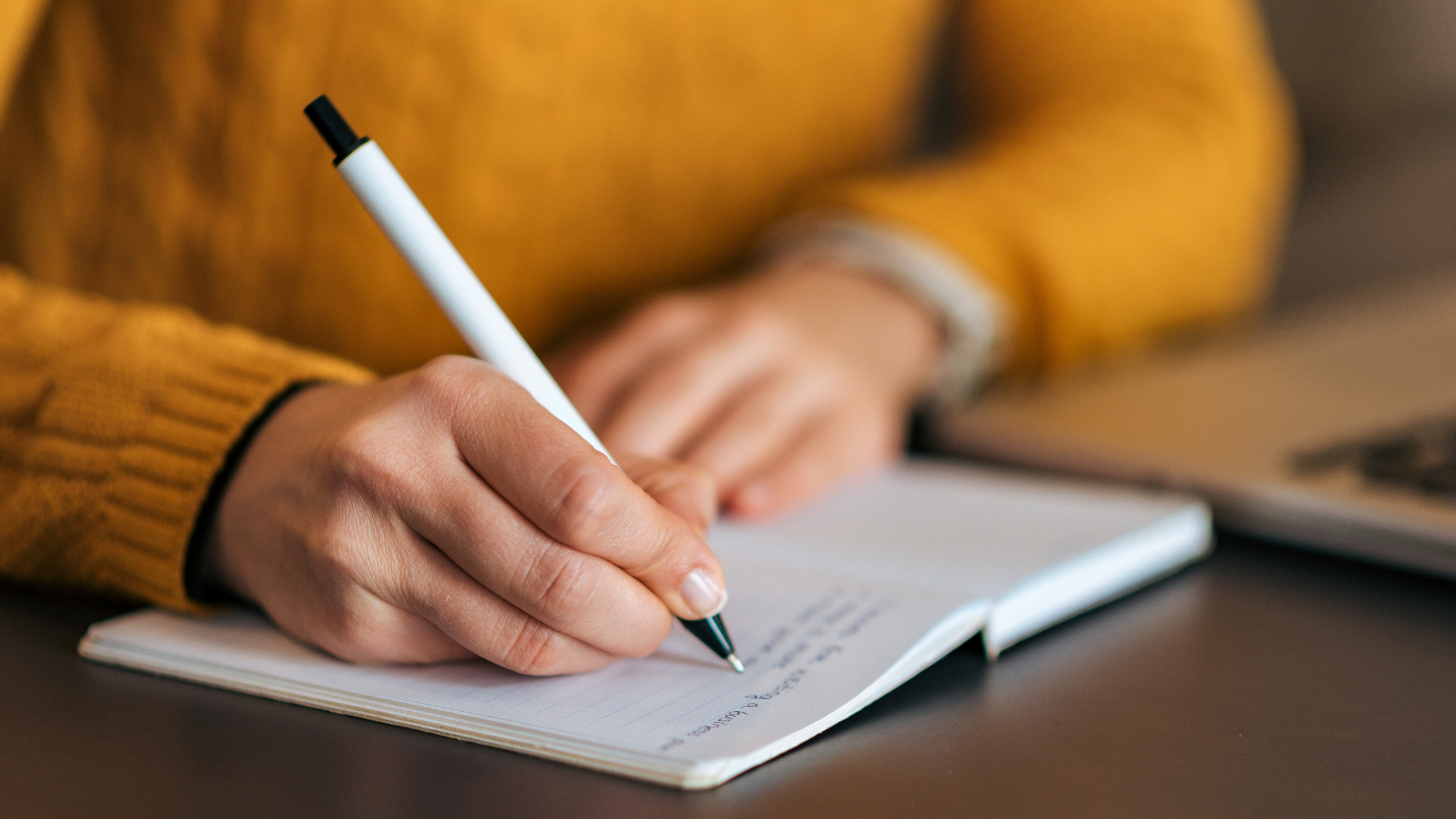 Person writing in journal with pen, representing documenting narcissistic abuse, recording narcissist behavior patterns, journaling for evidence, and protective documentation strategies against manipulation Person writing in journal with pen, representing documenting narcissistic abuse, recording narcissist behavior patterns, journaling for evidence, and protective documentation strategies against manipulation