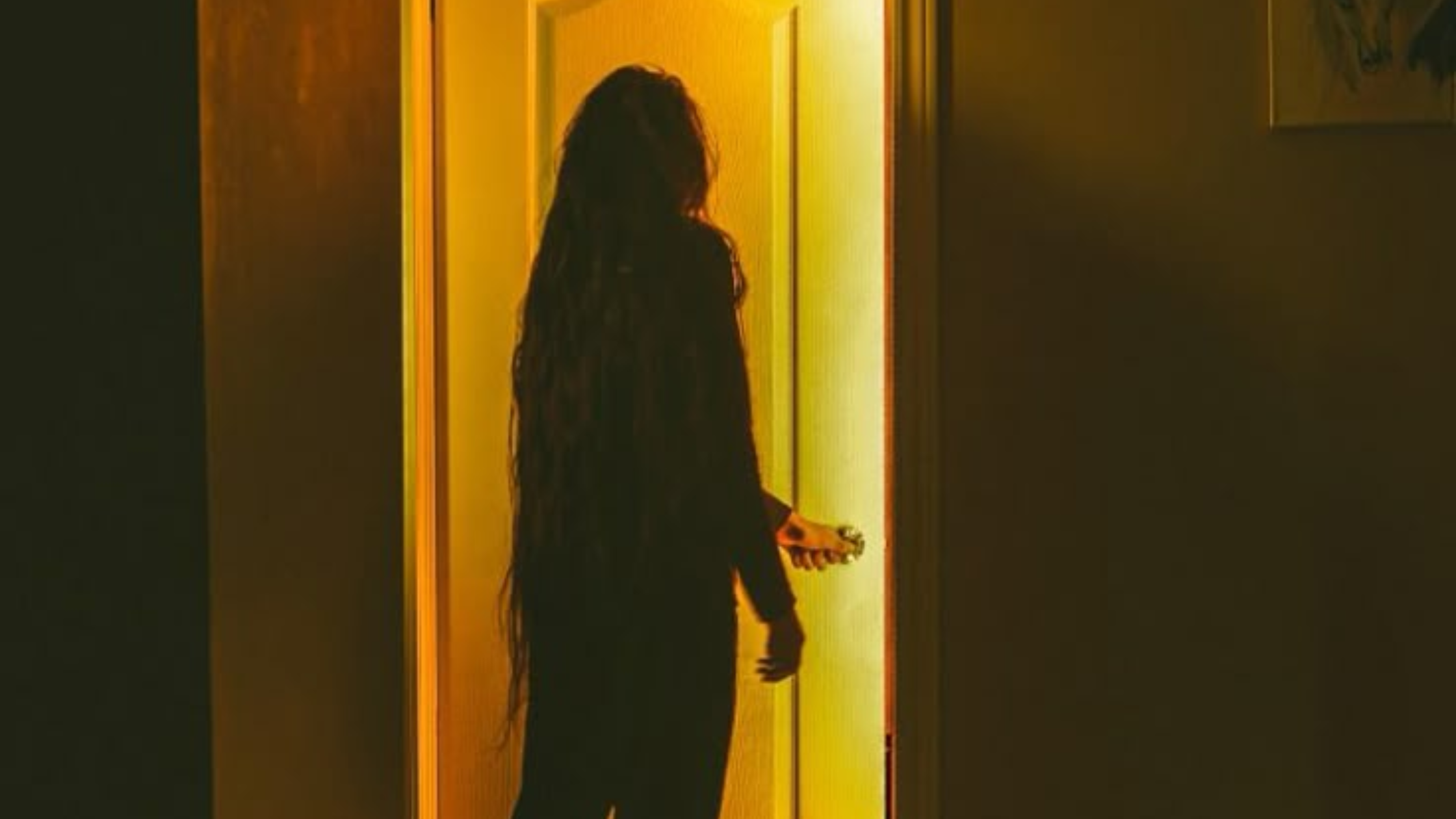 Woman standing in doorway reaching toward golden light, representing leaving narcissistic abuse, stepping into freedom, finding hope after darkness, new beginnings, and walking toward your healing and recovery journey Woman standing in doorway reaching toward golden light, representing leaving narcissistic abuse, stepping into freedom, finding hope after darkness, new beginnings, and walking toward your healing and recovery journey