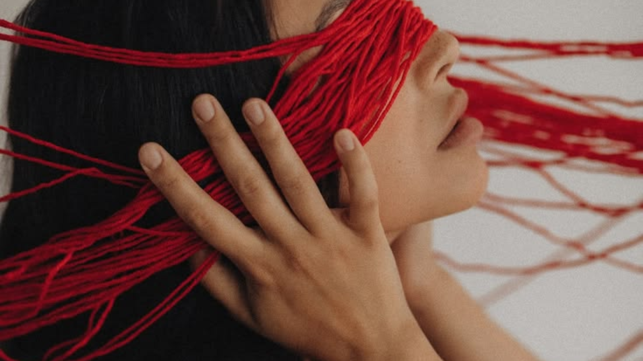 Hands tangled in red strings representing the long-term effects of narcissistic abuse, trauma bonding, emotional entanglement, lingering psychological impact, PTSD from narcissism, and understanding complex trauma recovery after abuse Hands tangled in red strings representing the long-term effects of narcissistic abuse, trauma bonding, emotional entanglement, lingering psychological impact, PTSD from narcissism, and understanding complex trauma recovery after abuse