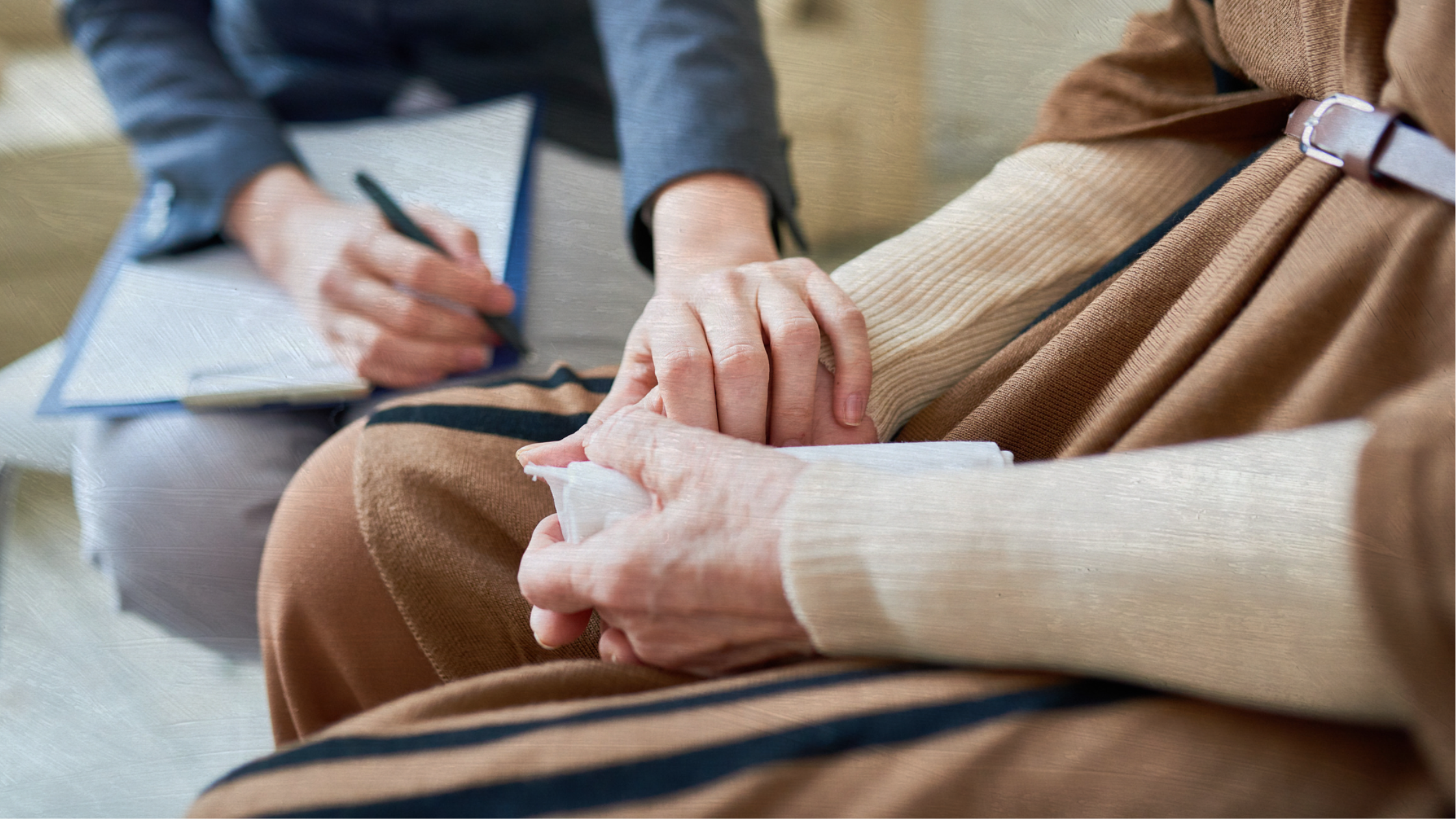 Therapist taking notes while compassionately supporting client during narcissistic abuse recovery session, representing recognizing healing progress, professional support, documenting recovery milestones, validating healing signs, therapy benefits, and measuring personal growth