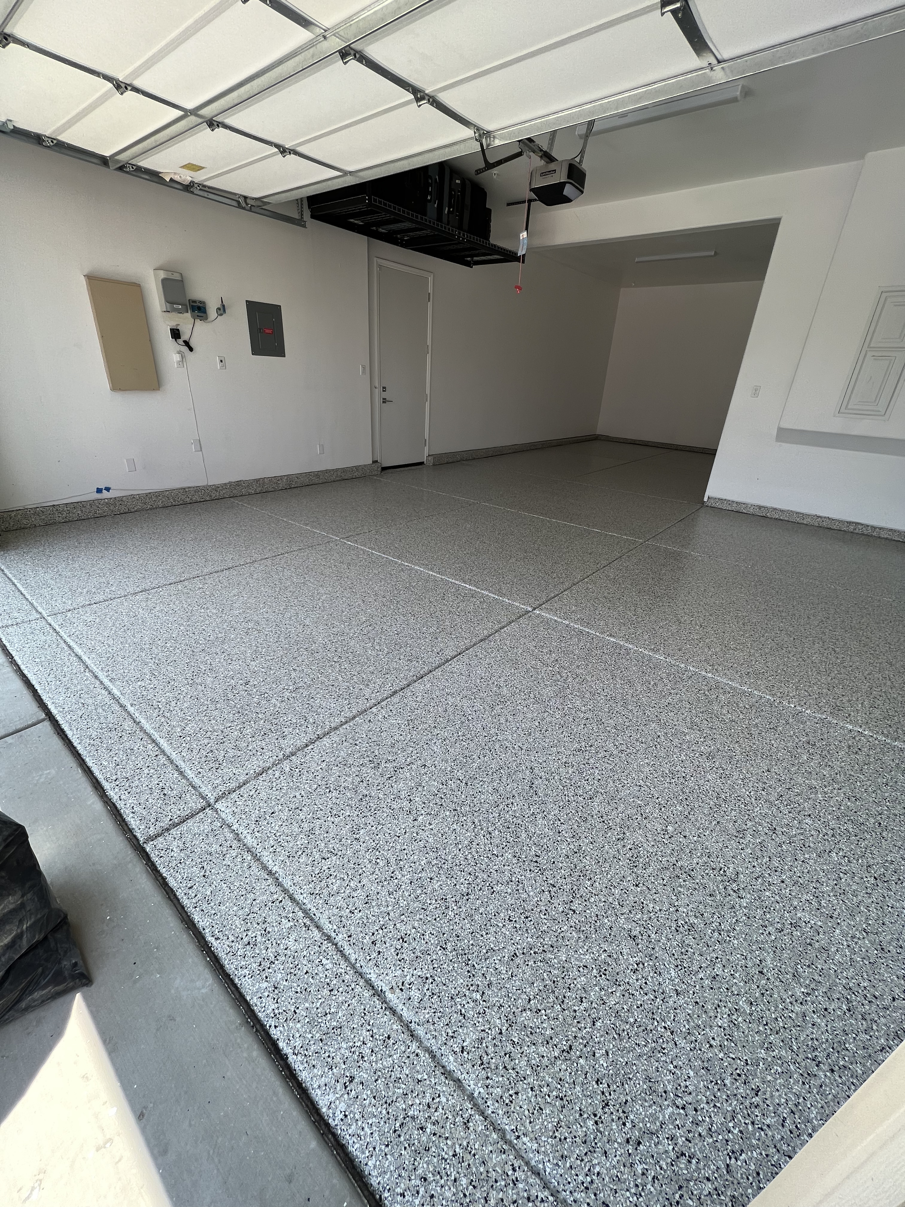 Decorative flake epoxy garage floor in [[CITY]]