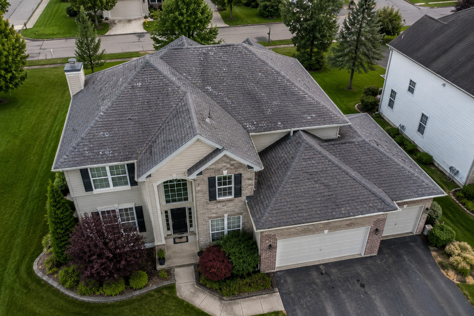 Hail damage roof repair Stoughton WI - hail damage insurance claim Dane County - Badger Roofing of Wisconsin