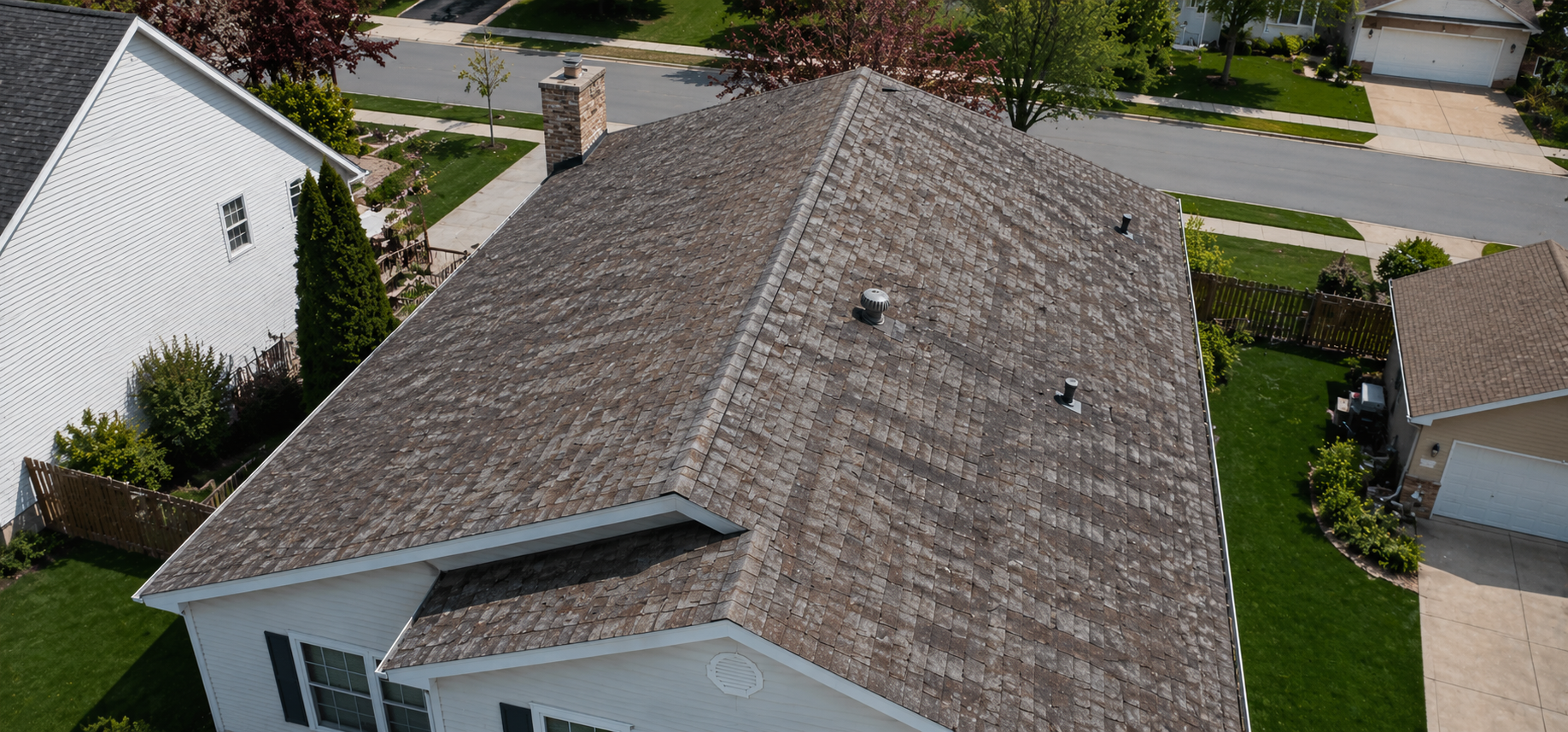 aging asphalt shingle roof Stoughton WI | Badger Roofing of Wisconsin