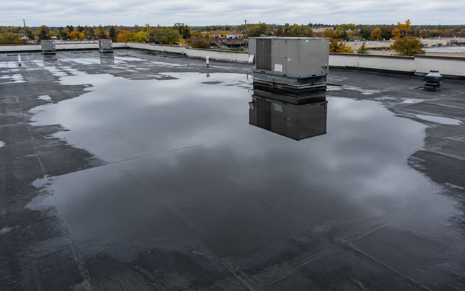 ponding water commercial flat roof Stoughton WI - Badger Roofing of Wisconsin
