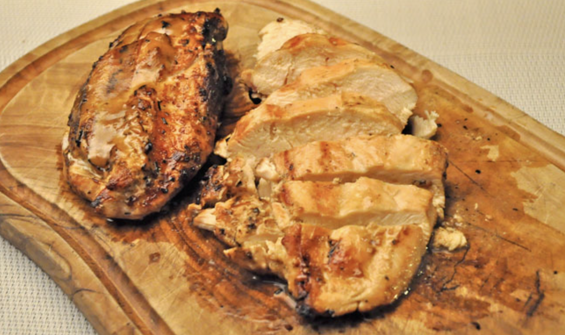 Aioli stuffed chicken breast sliced to show the mayo filling, 20g protein per portion