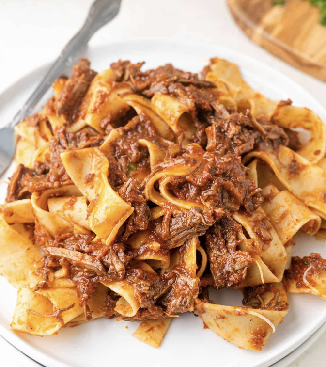 Lean beef ragu over shirataki noodles with ricotta, 20g protein per portion Lean beef ragu over shirataki noodles with ricotta, 20g protein per portion
