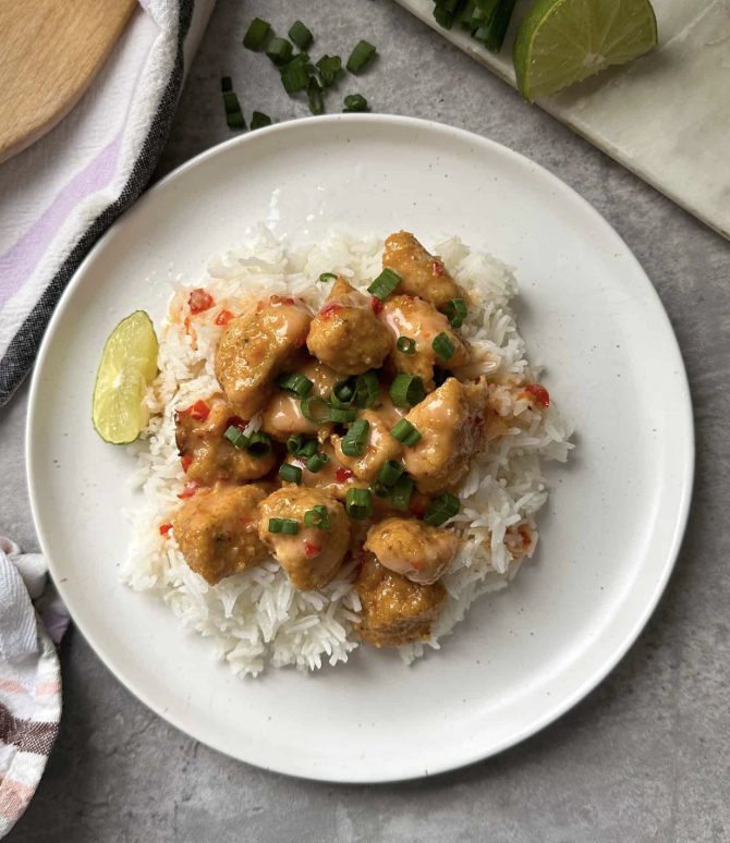 Bang bang chicken over rice with sweet spicy sauce, 23g protein per portion Bang bang chicken over rice with sweet spicy sauce, 23g protein per portion