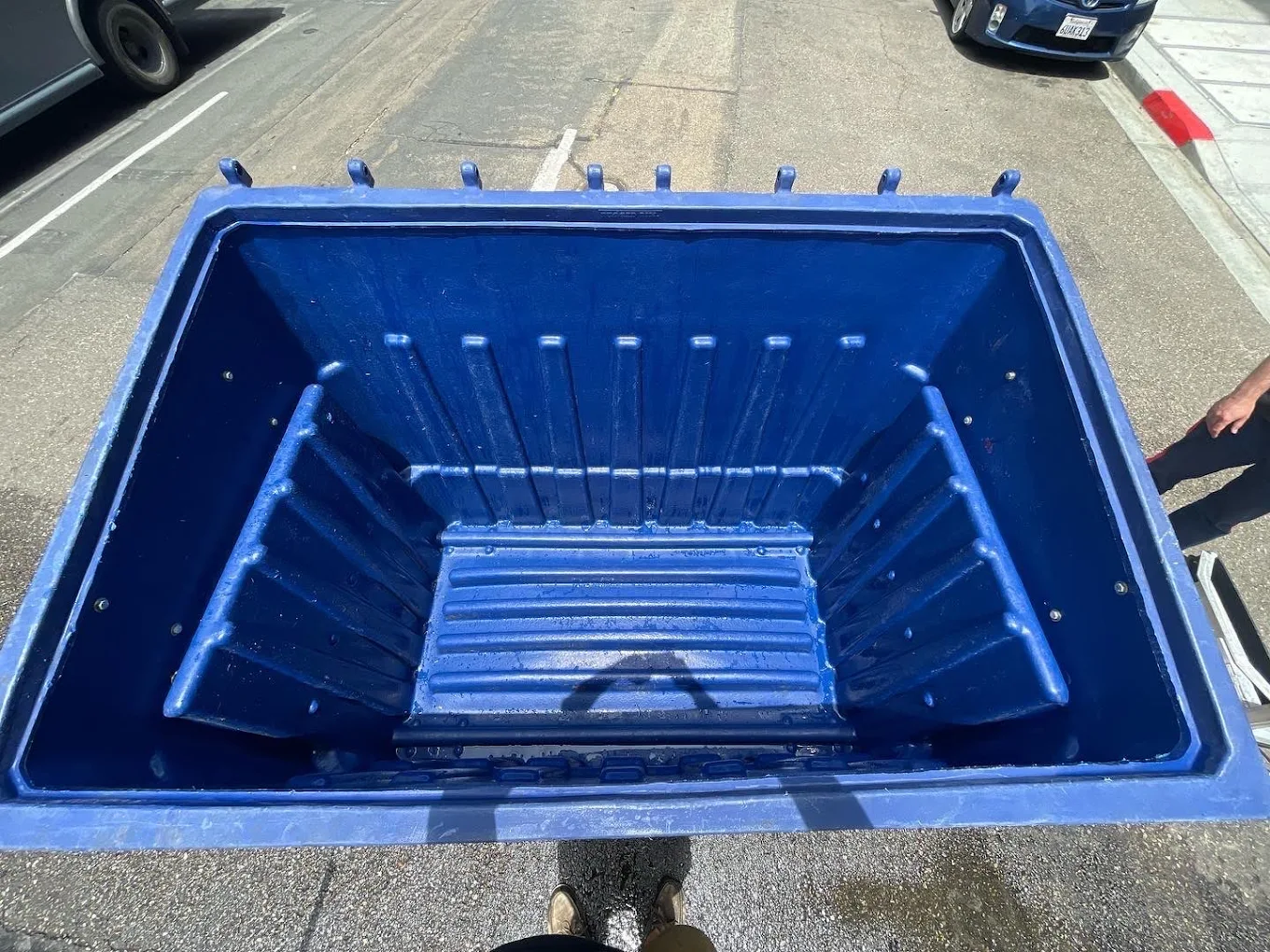 Clean and sanitized blue dumpster after professional dumpster cleaning service in San Diego