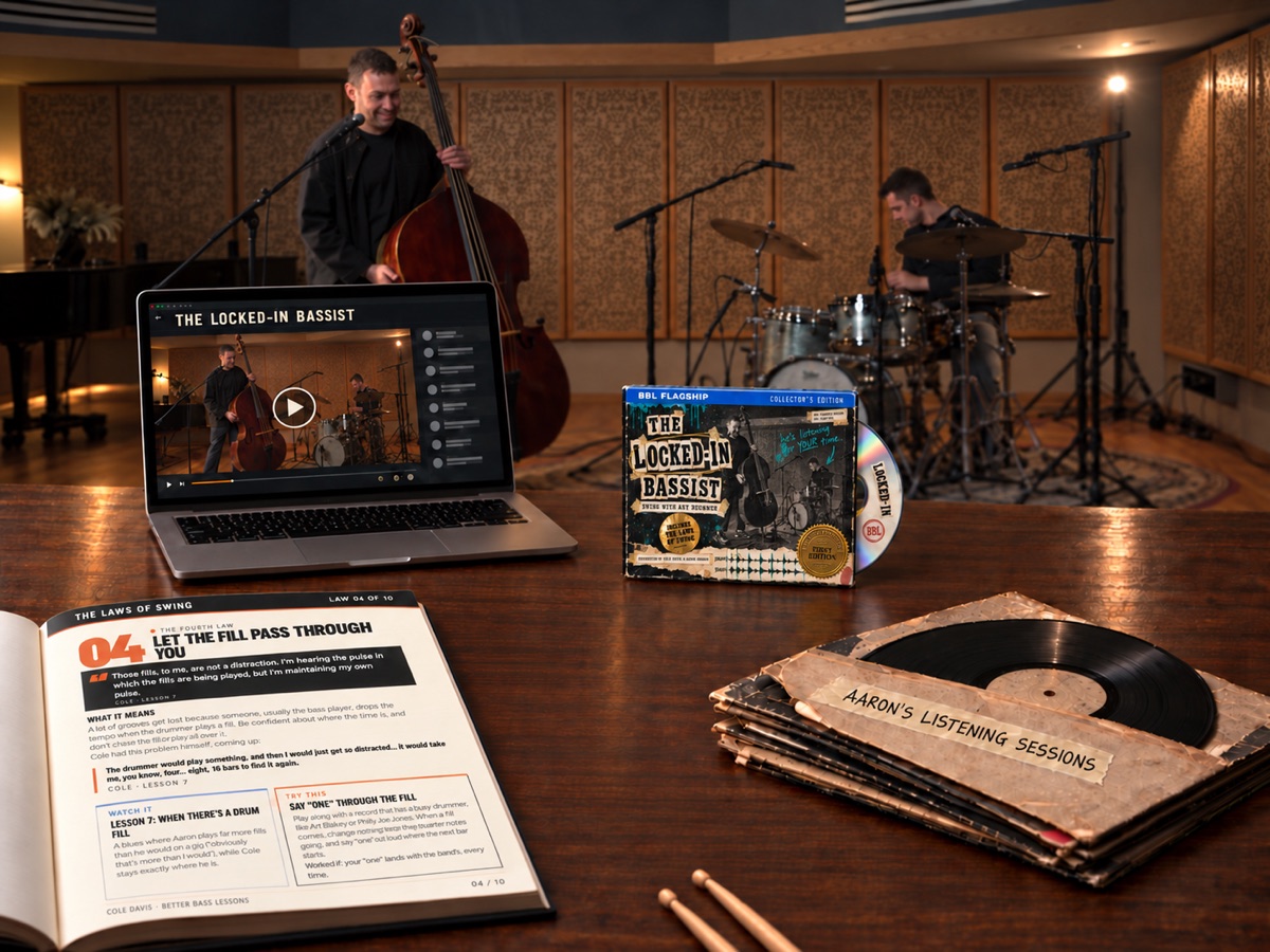 The Locked-In Bassist course on a laptop and phone, with The Laws of Swing PDF open beside it