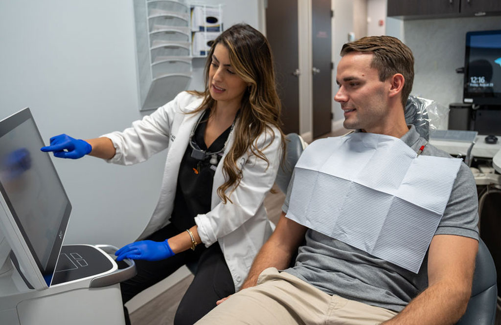 Woman holding invisalign