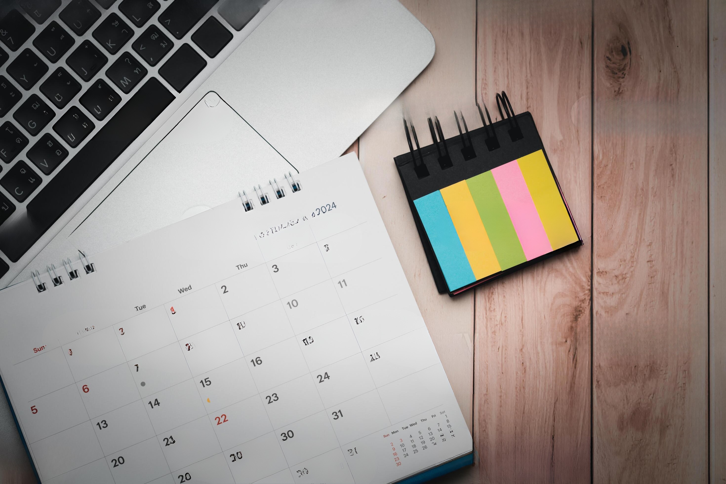  A calendar and notes on a desk