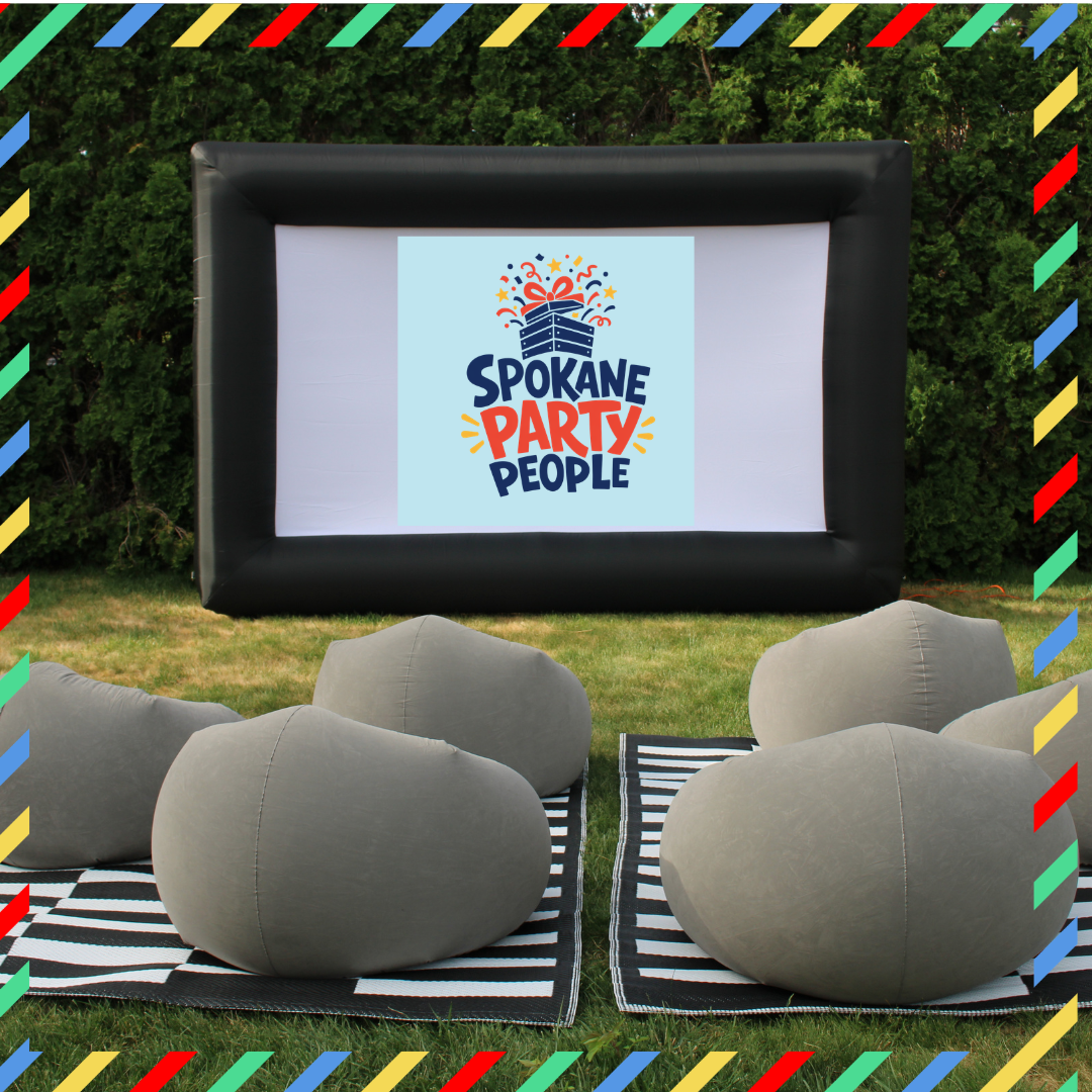 Backyard Movie Night Party Crate setup with inflatable movie screen, projector, cozy seating, and ambient lighting