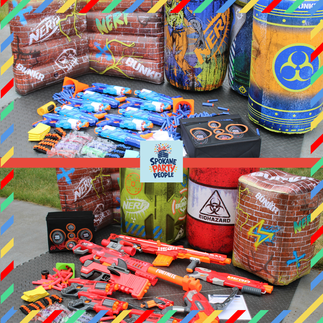 Overhead view of a Spokane Party People Blaster Battle crate with foam-dart blasters, darts, safety eyewear, team markers, barriers, boundary cones, and game cards laid out neatly