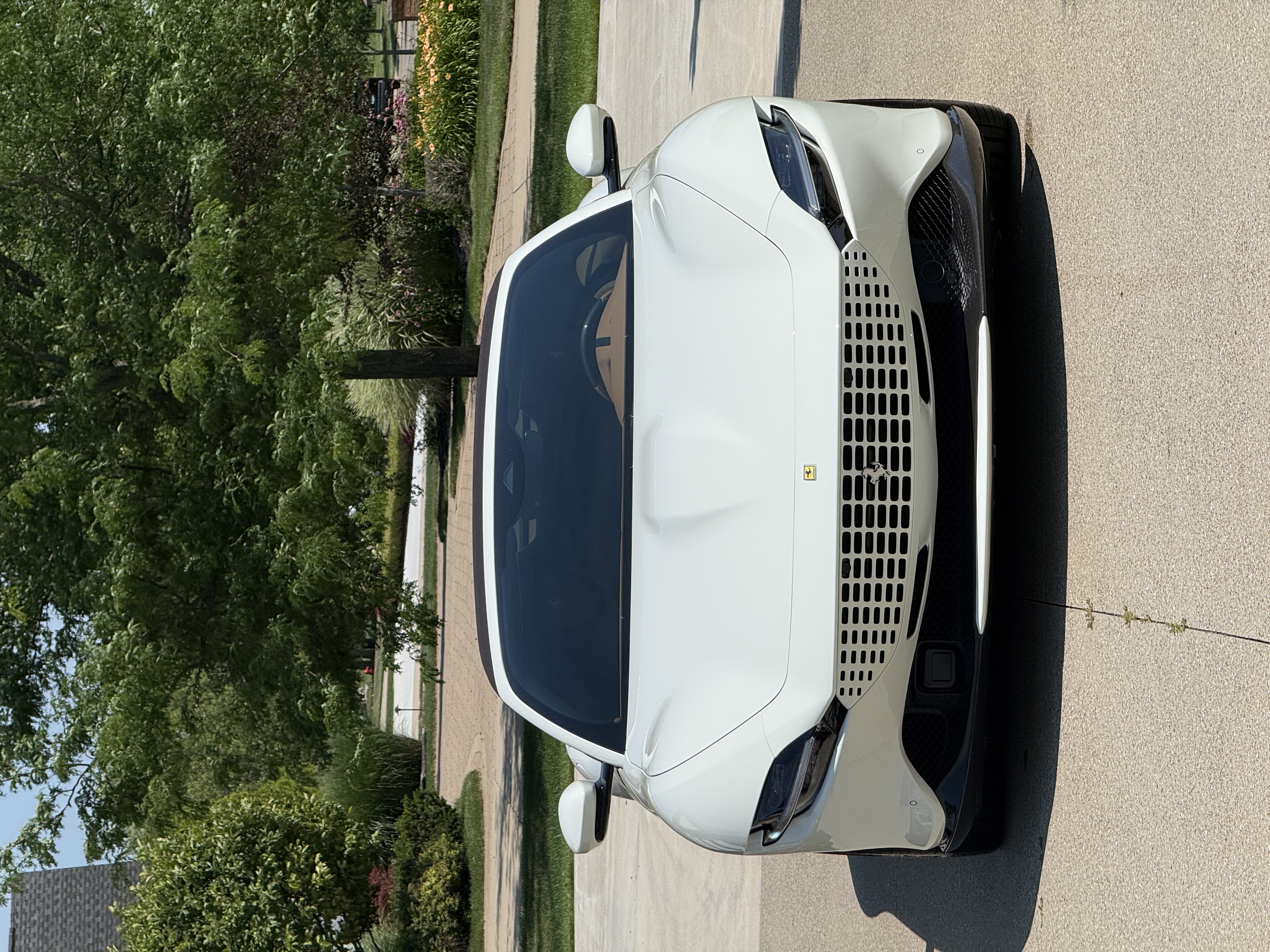 White Ferrari Roma at Elevate Automotive in Novi