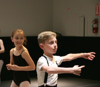 Young dancer in class