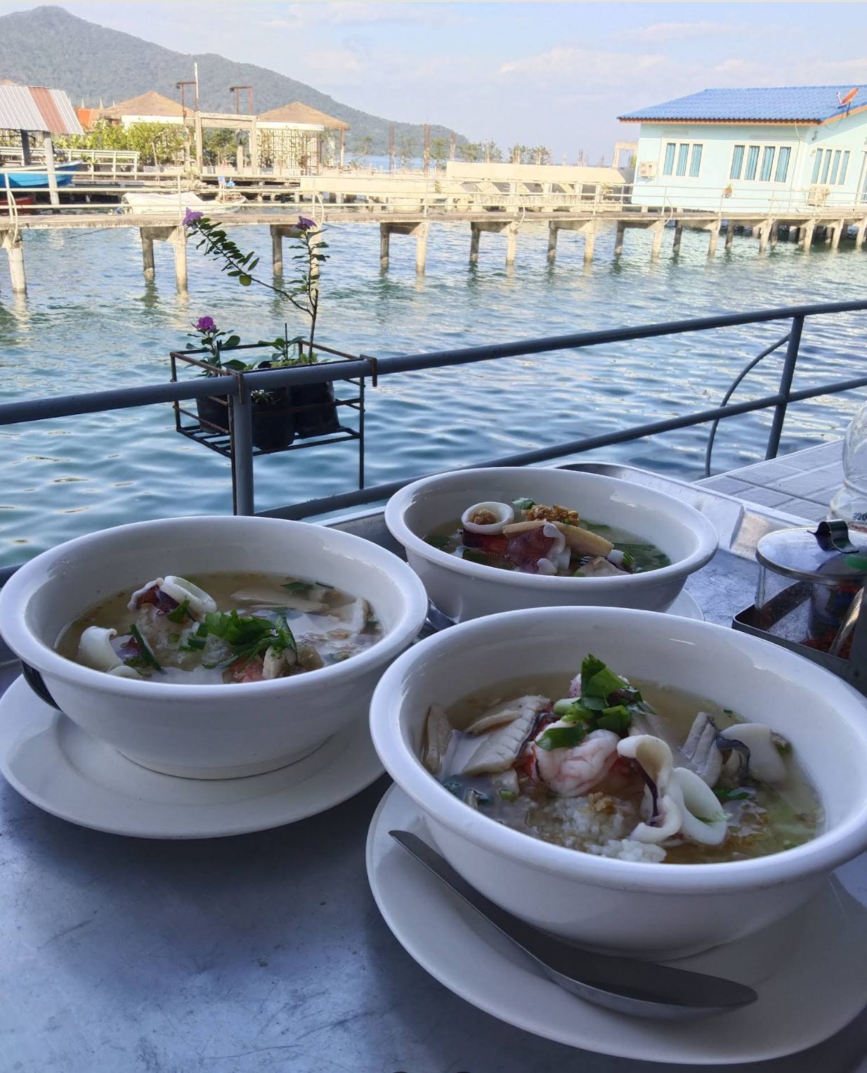 Breakfast on the private terrace of an overwater cottage