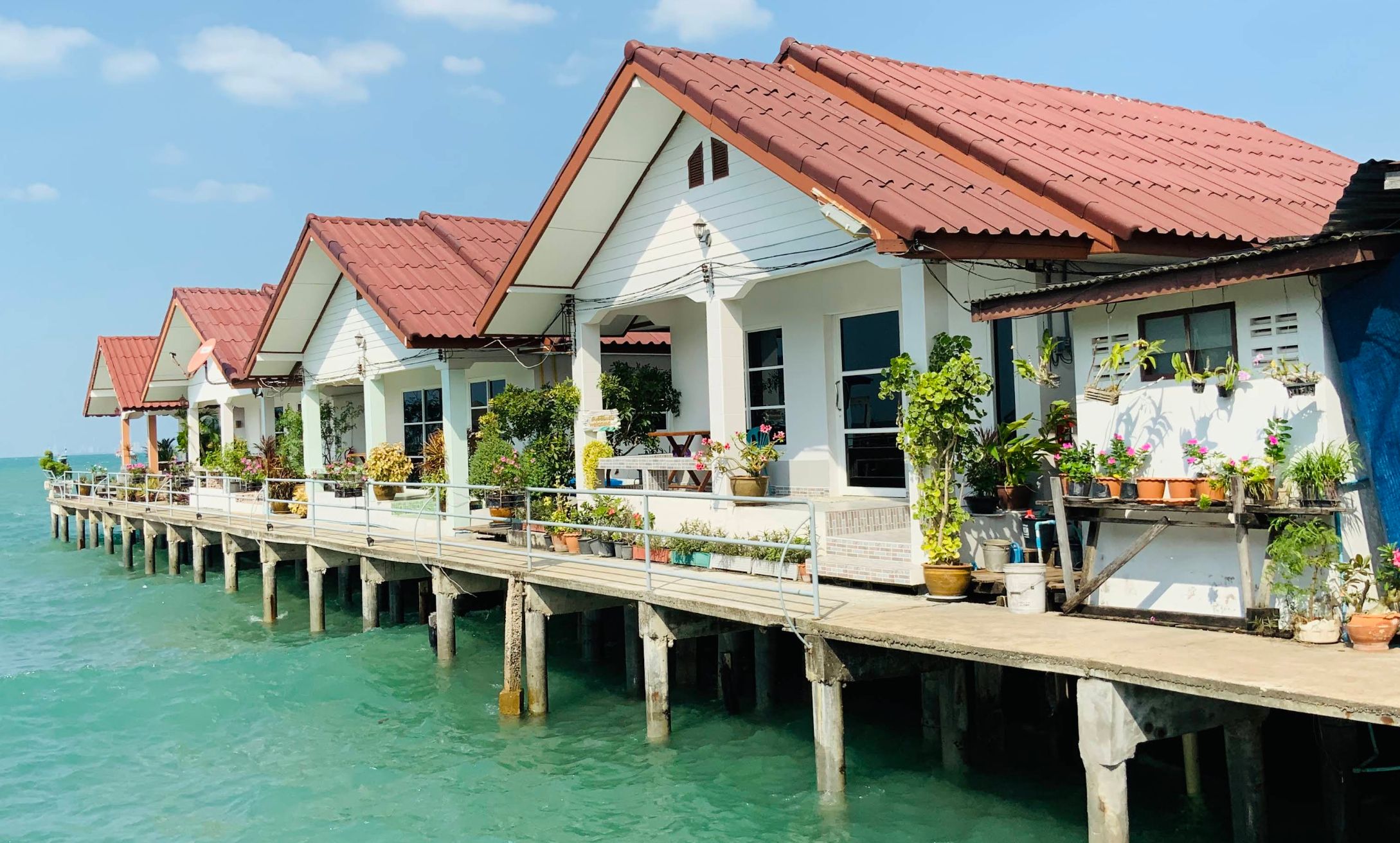 Overwater cottages at Baan Muk Talay homestay in Bang Sare, Thailand