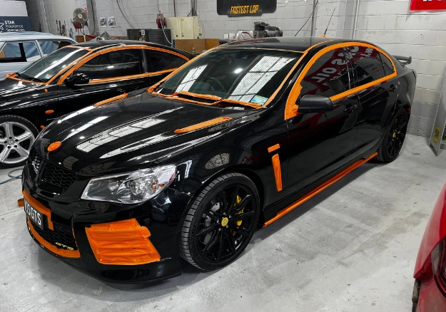 Professional cut and polish service restoring shine and gloss to vehicle paintwork