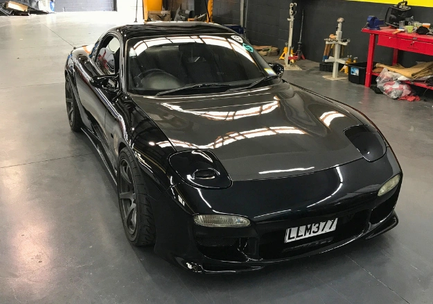 Professional cut and polish transformation improving vehicle paint shine