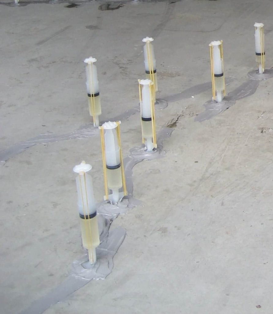 Foundation crack injection repair with epoxy