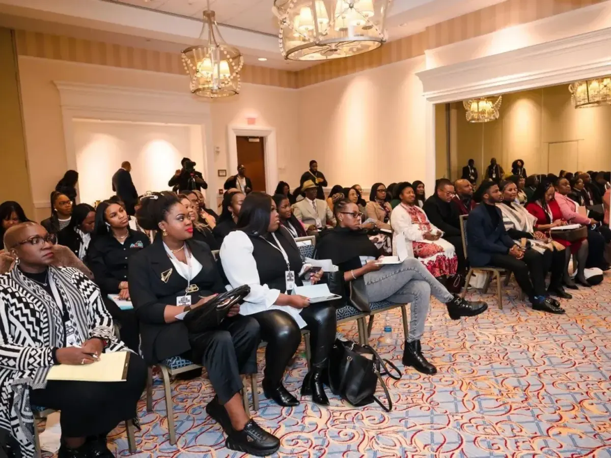 Attendees seated and taking notes at a Career Haven live funding event