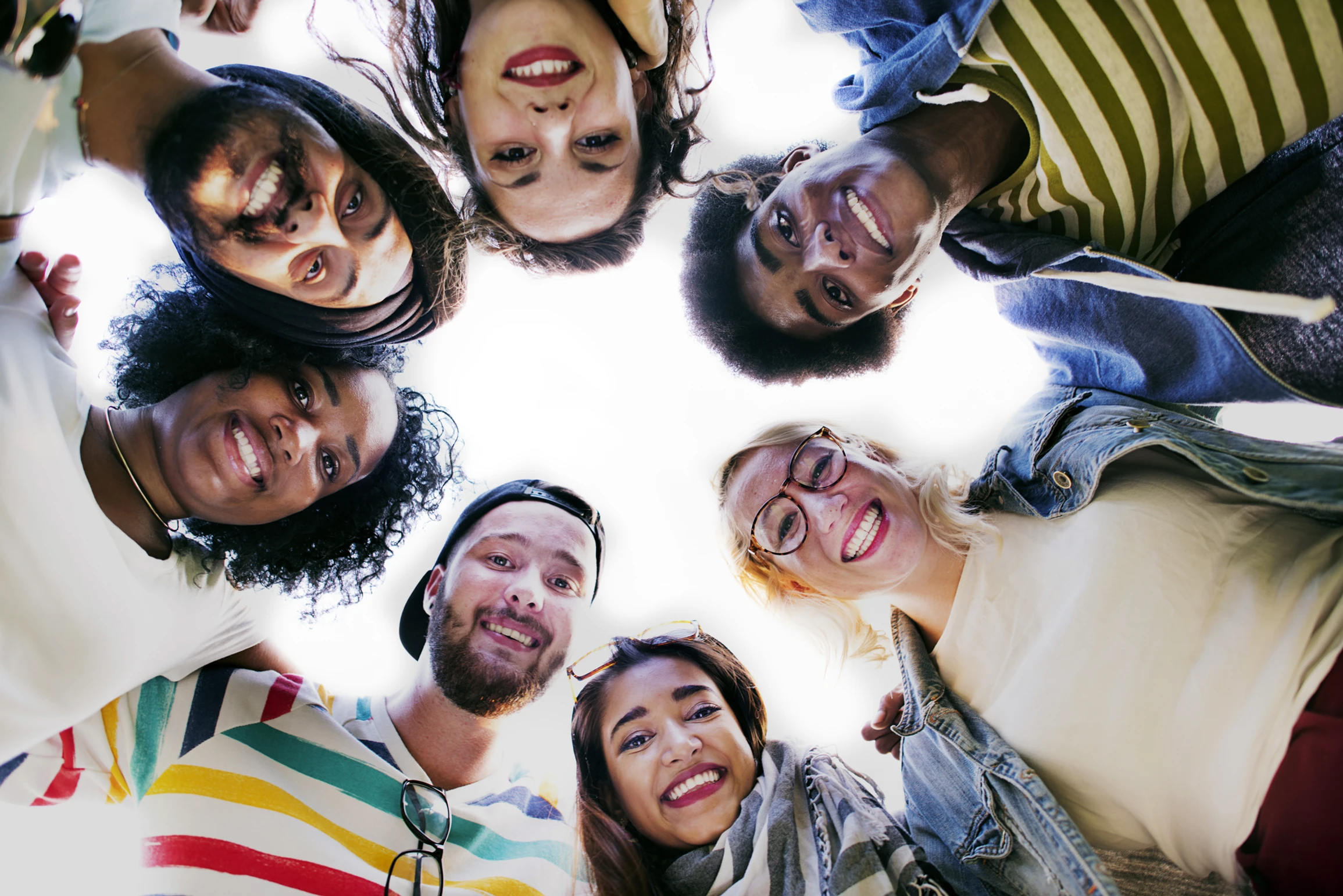 A group of people, smiling at the camera